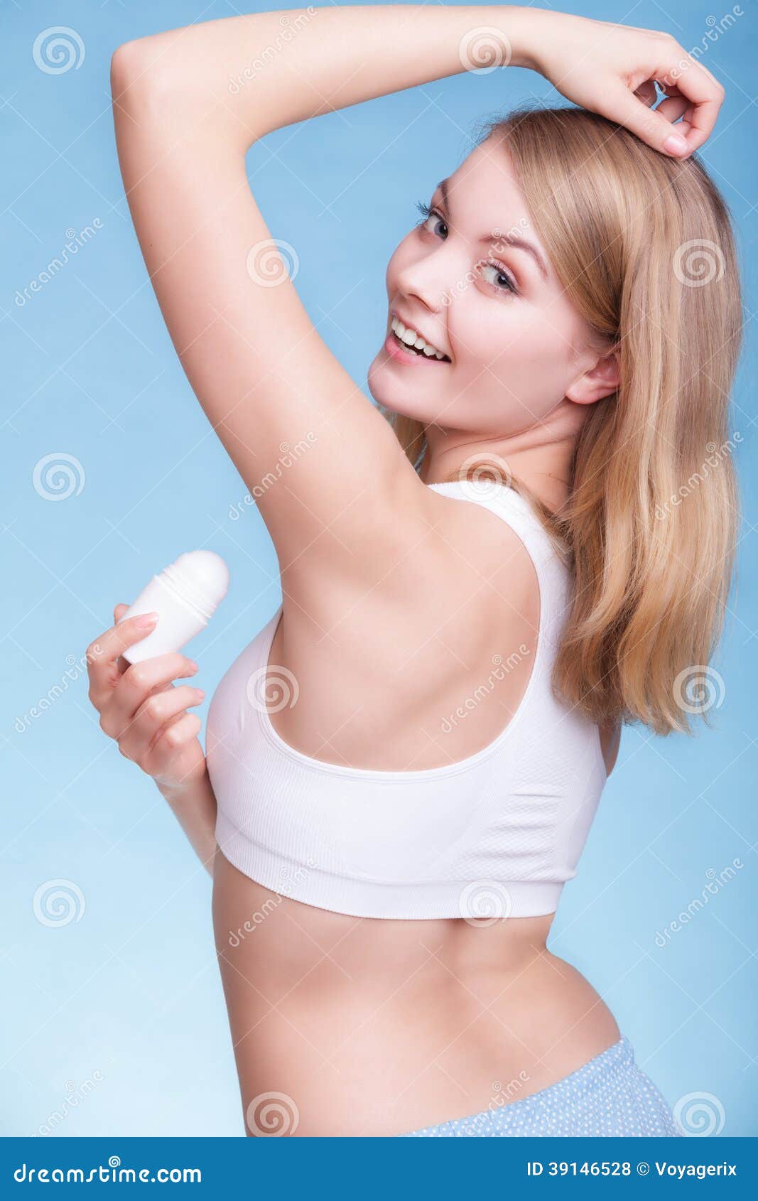 Girl Applying Stick Deodorant In Armpit. Skin Care Stock Photo - Image