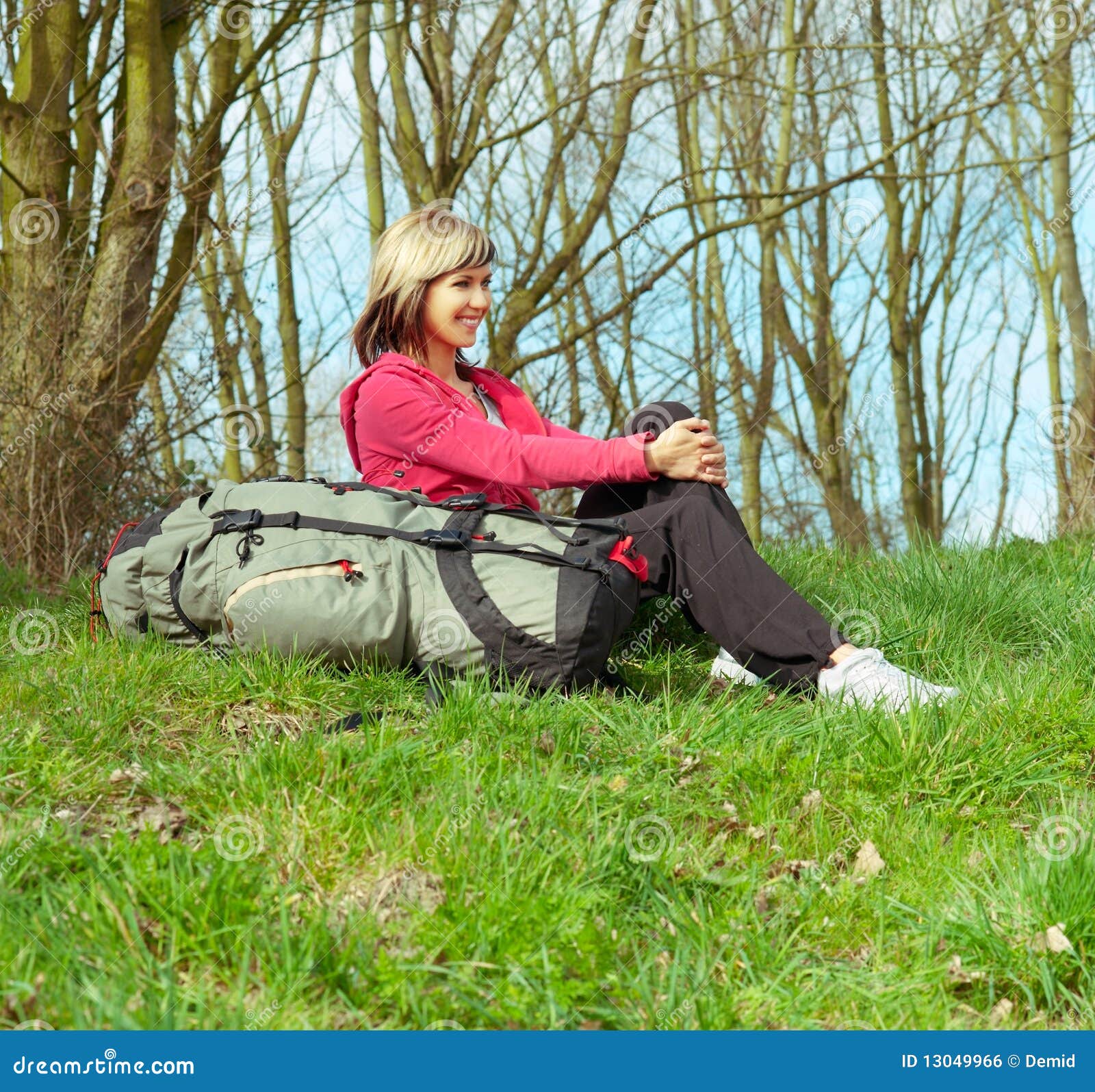 Girl with a Backpack stock photo. Image of green, landscape 13049966