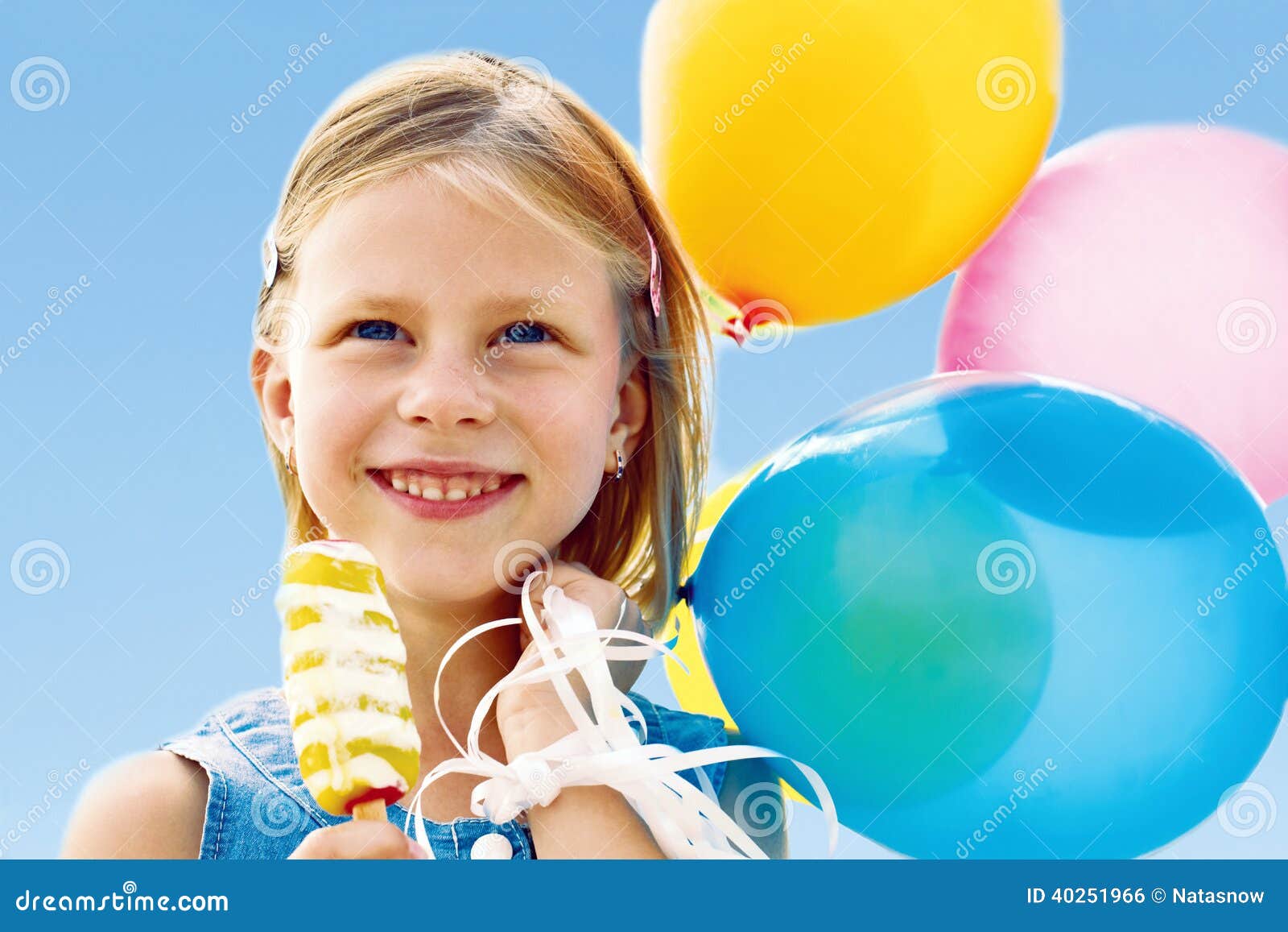 Girl with balloons stock photo. Image of blue, holiday 40251966