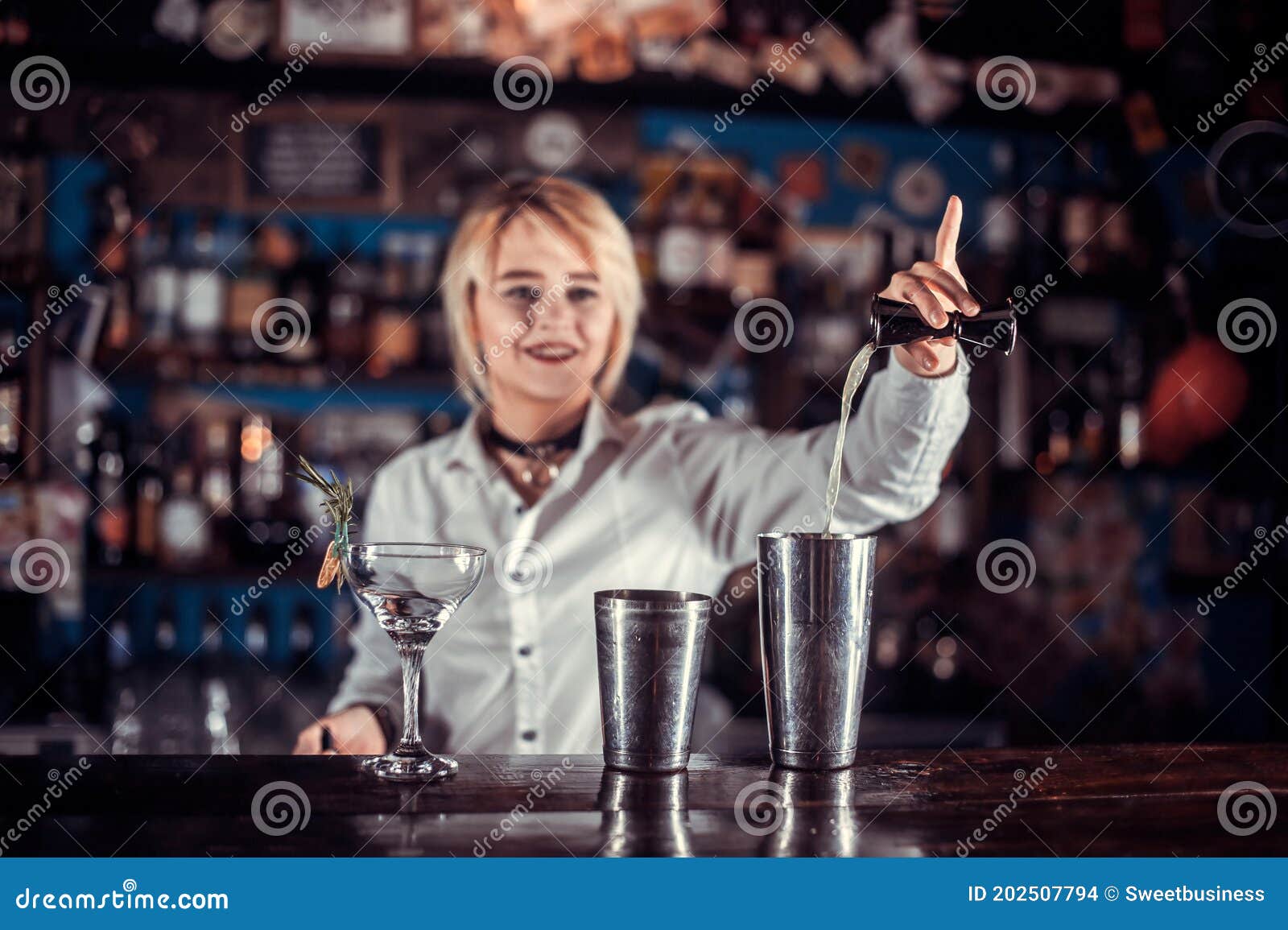 Girl Barman Formulates a Cocktail in the Porterhouse Stock Photo ...