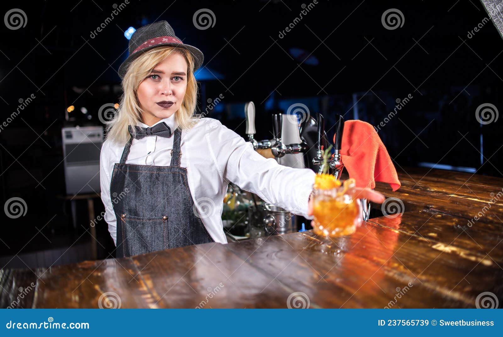 Girl Bartender Mixes a Cocktail Behind the Bar Stock Image - Image of ...