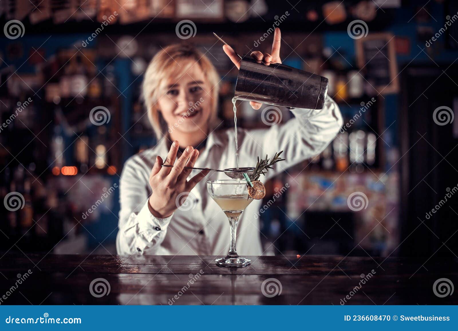 Girl Barman Concocts a Cocktail on the Porterhouse Stock Photo - Image ...