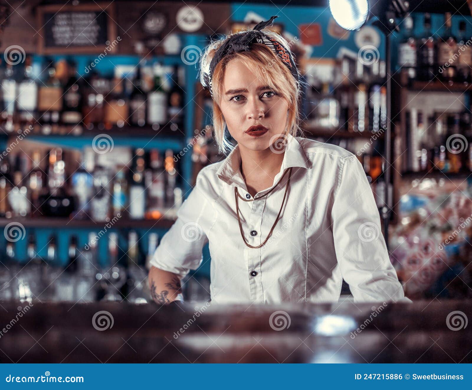 Girl Barman Formulates a Cocktail on the Porterhouse Stock Photo ...