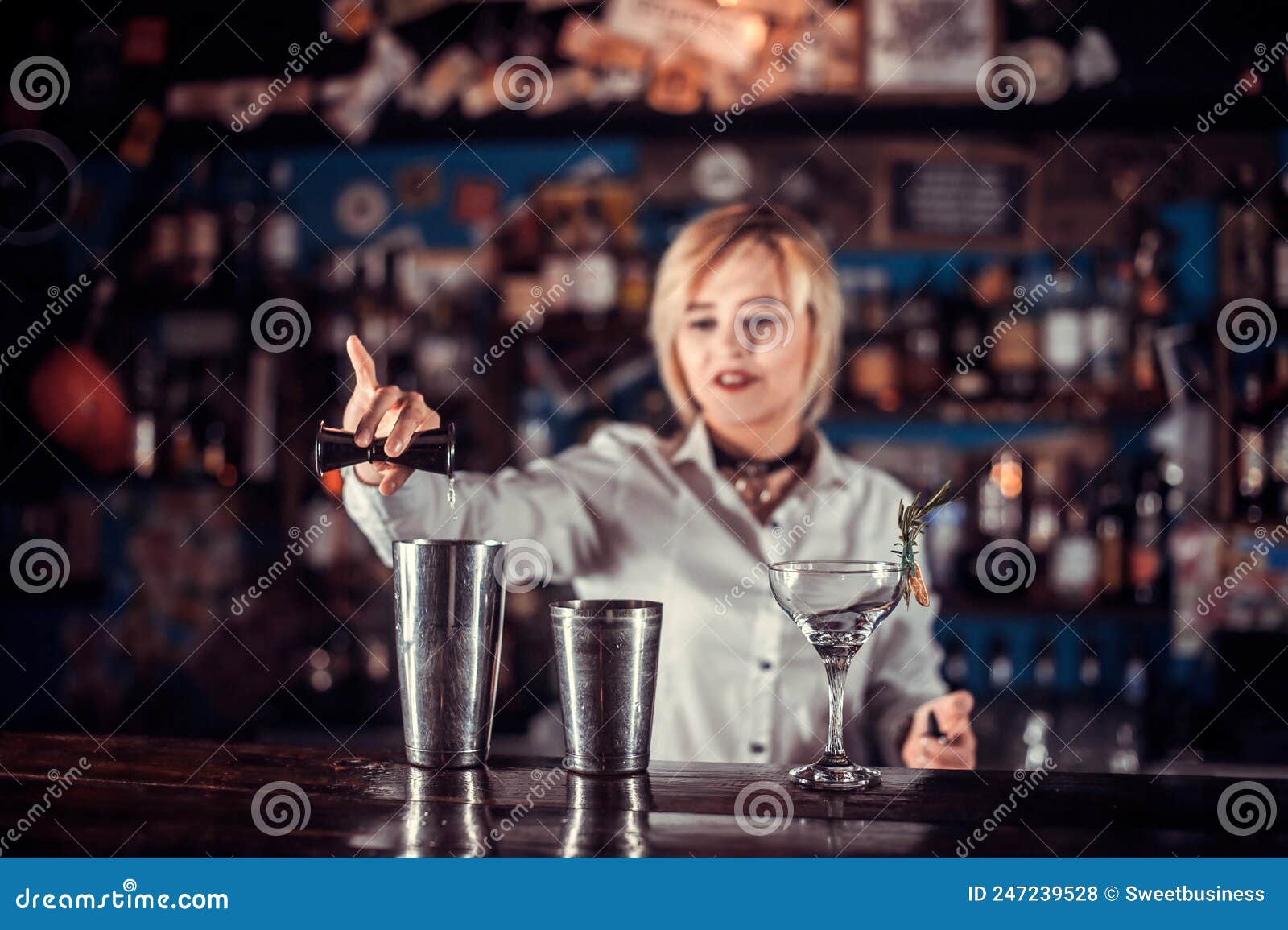 Girl Bartender Makes a Cocktail Behind the Bar Stock Photo - Image of ...