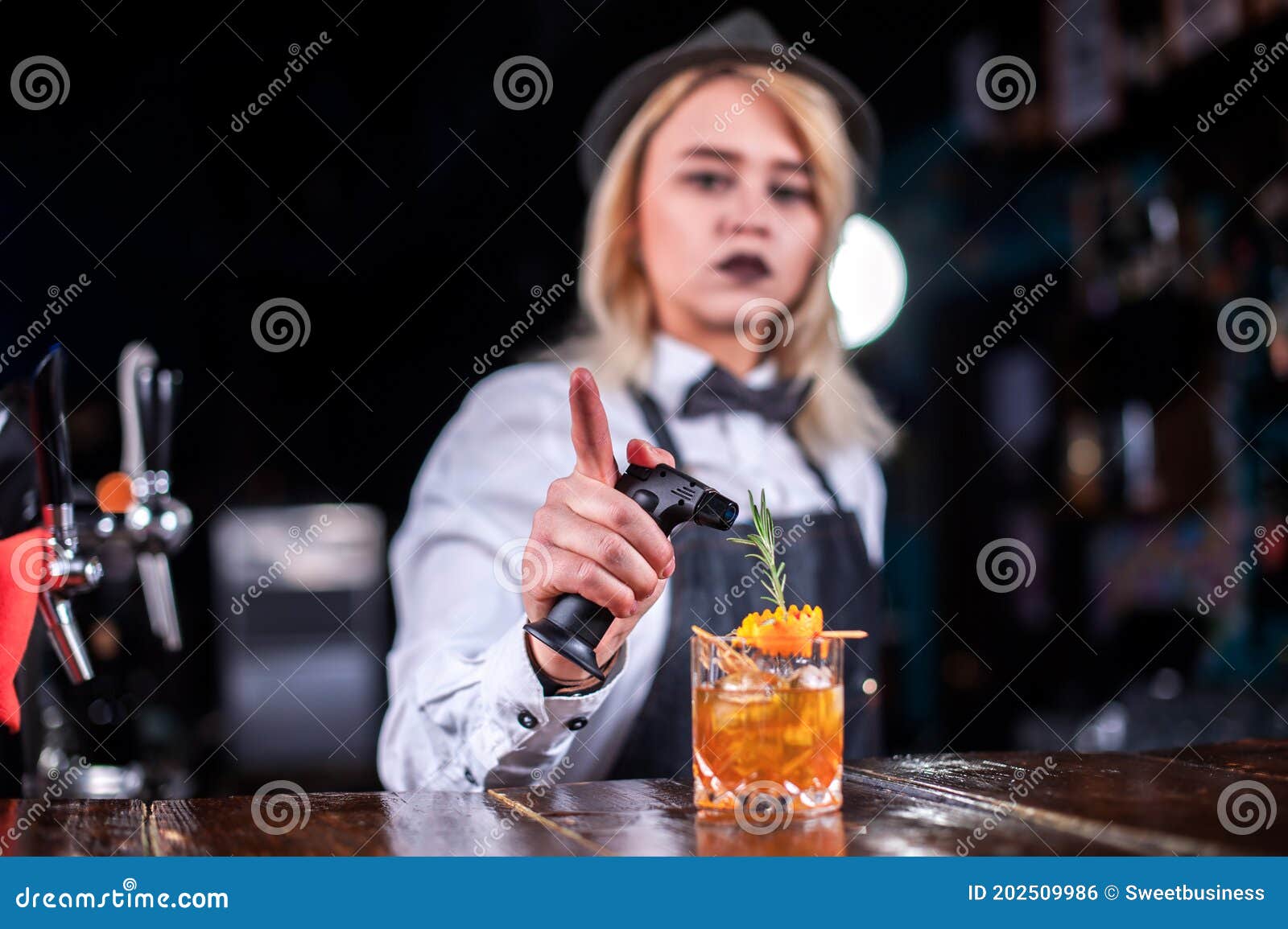 Girl Bartender Mixes a Cocktail in the Bar Stock Photo - Image of ...