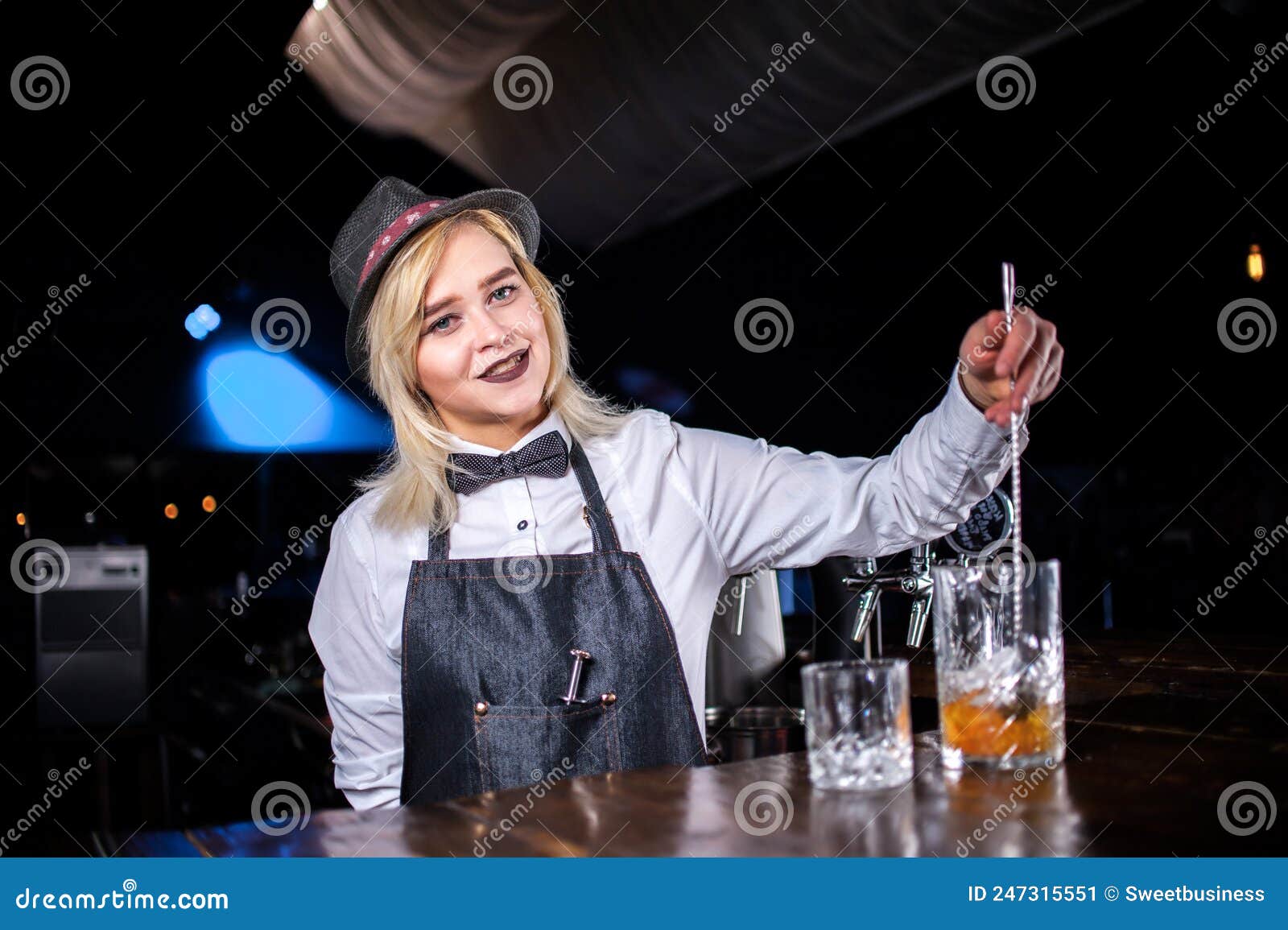 Girl Bartender Creates a Cocktail in the Saloon Stock Image - Image of ...