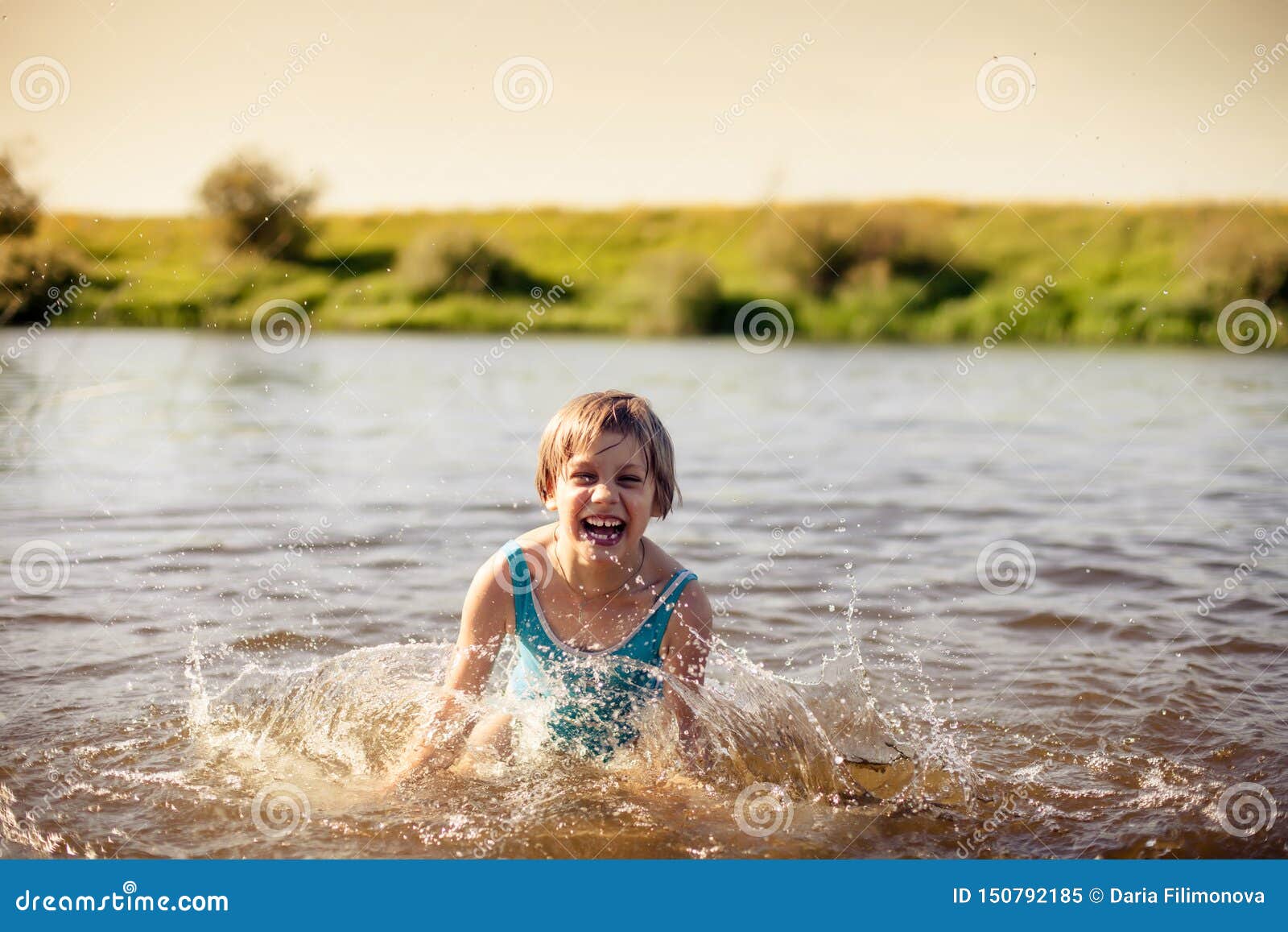 Girl Swimming in Warm River Stock Image - Image of young, swim: 150792185