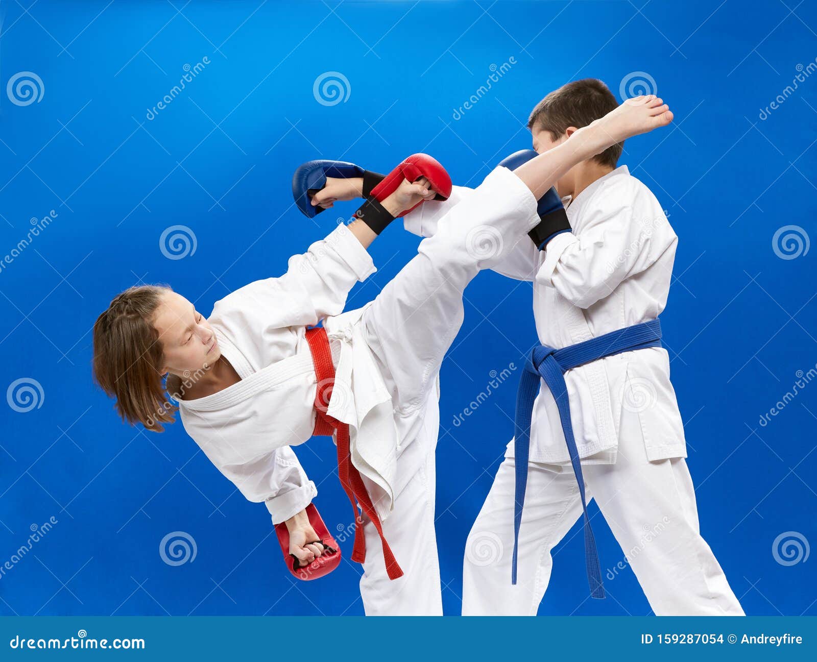 Girl Beats Boy Kick Leg in the Head Stock Photo Image of kickboxing