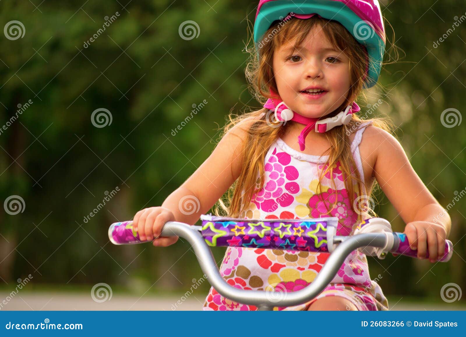 Girl on Bike stock photo. Image of eyes, child 26083266