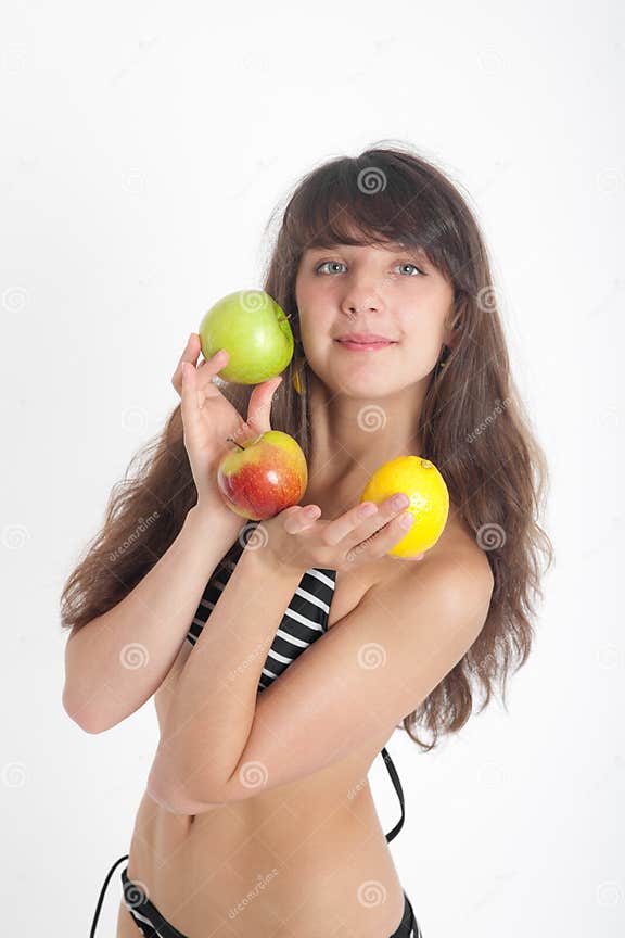 Girl in bikini with fruit stock photo. Image of lemon 20038700