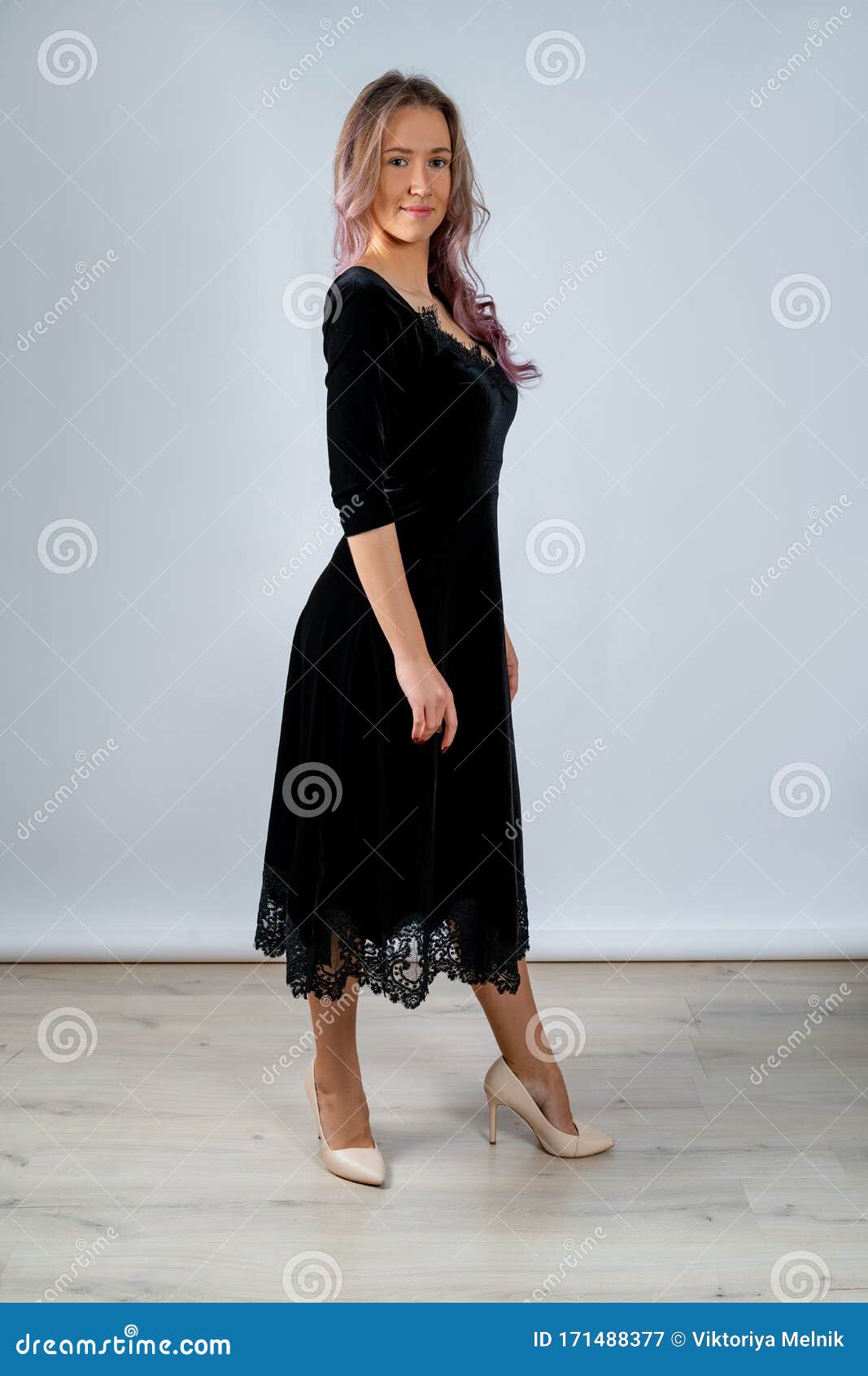 black dress and beige heels