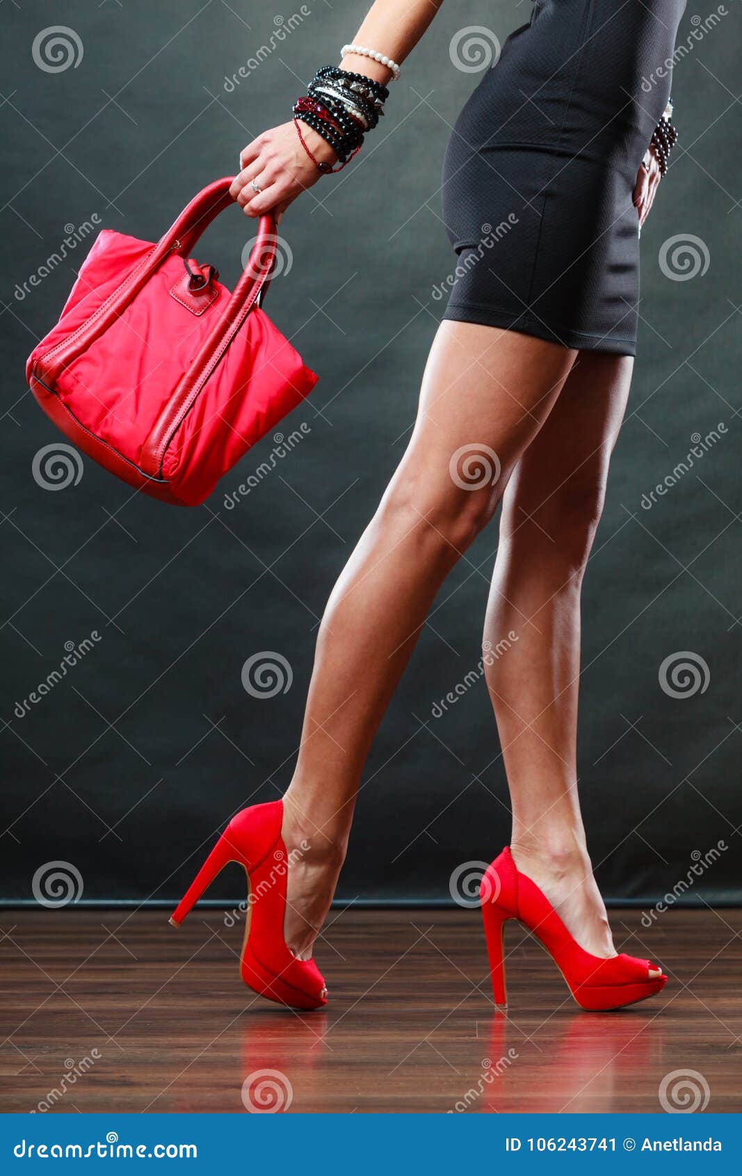 black dress with red sneakers