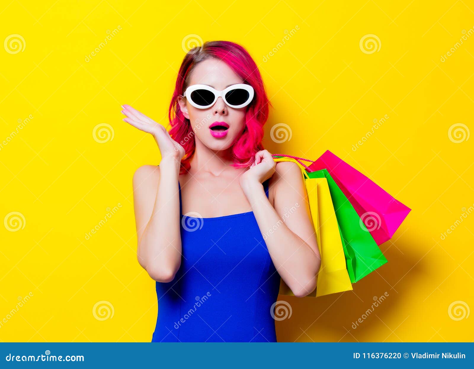 Girl in Blue Dress with Colored Shopping Bags Stock Photo - Image of ...