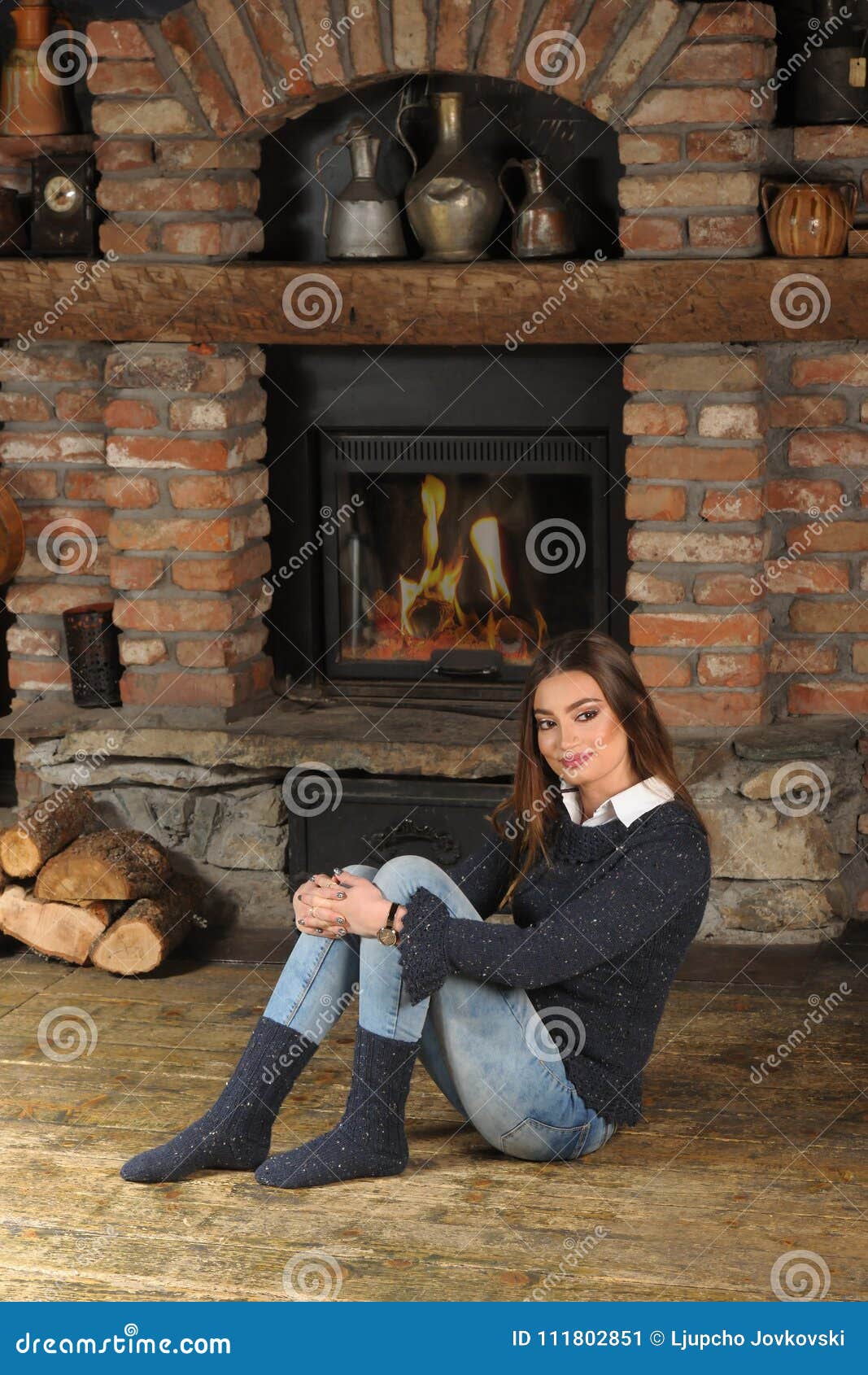 A Girl In A Blue Handmade Sweater And Socks Stock Image Image Of