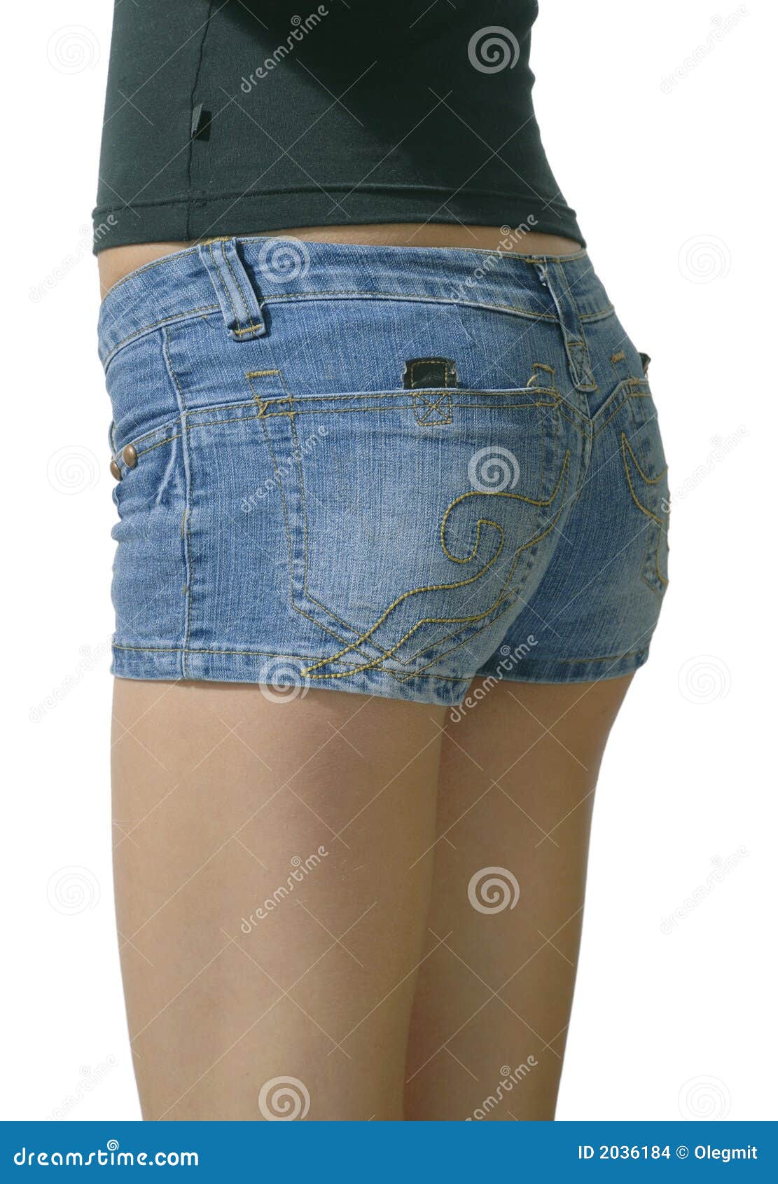 Girl in blue jeans short shorts isolated on white background