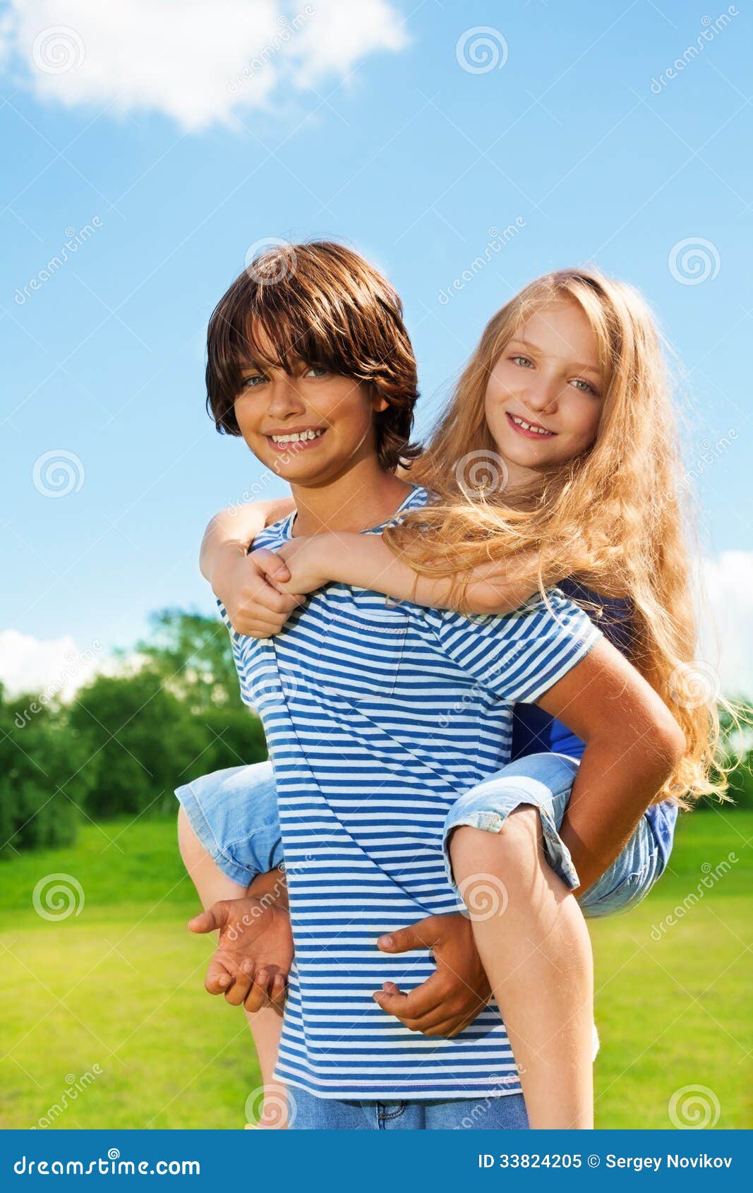 girl carrying boy