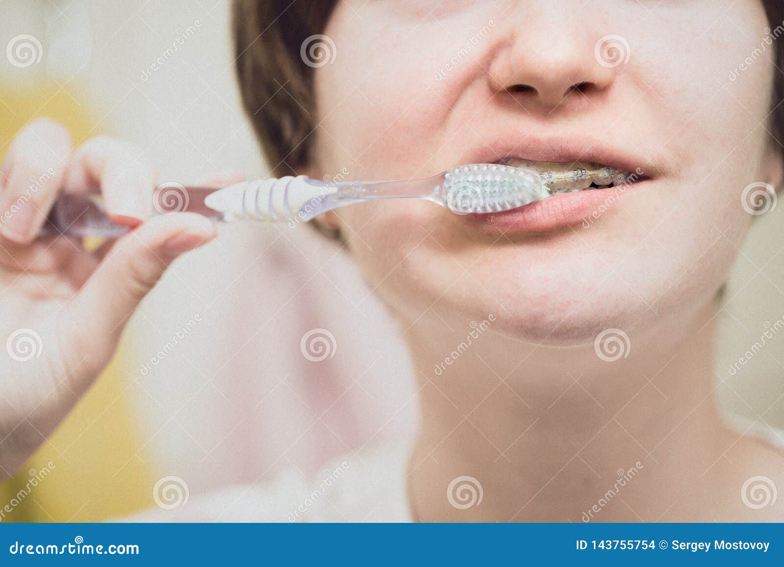 Girl With Braces Brushing Her Teeth Stock Photo Image Of Brace