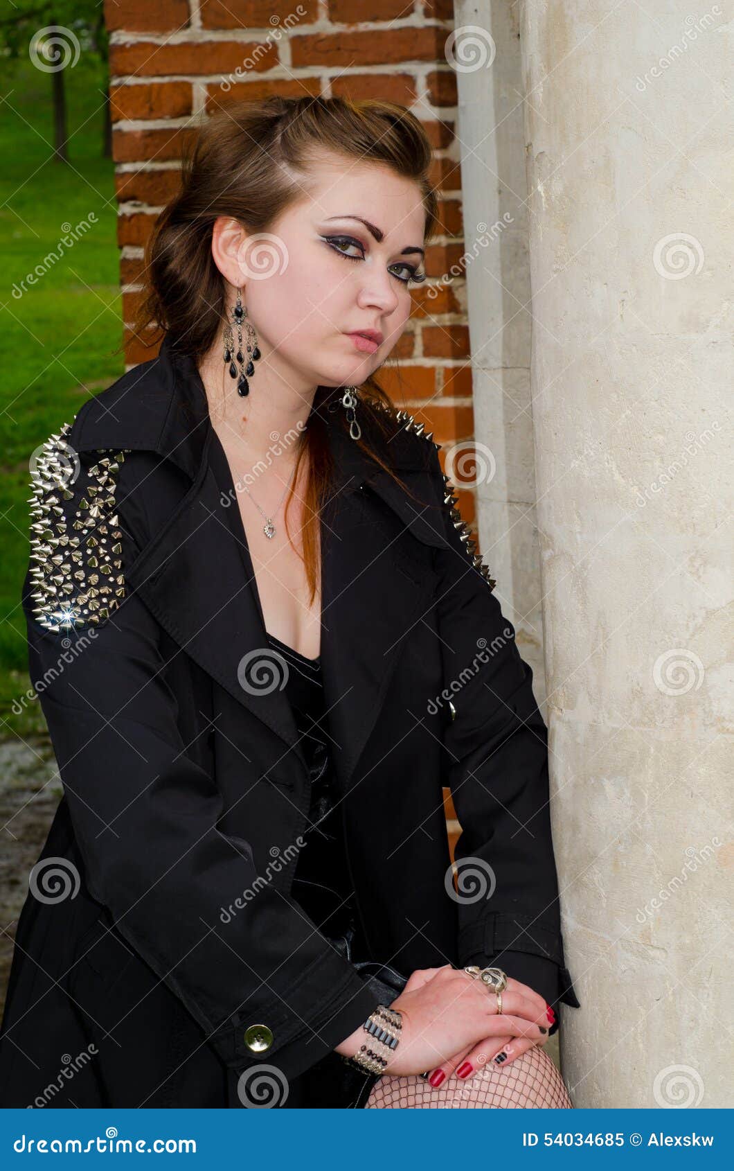 The girl at a brick wall stock image. Image of dress - 54034685