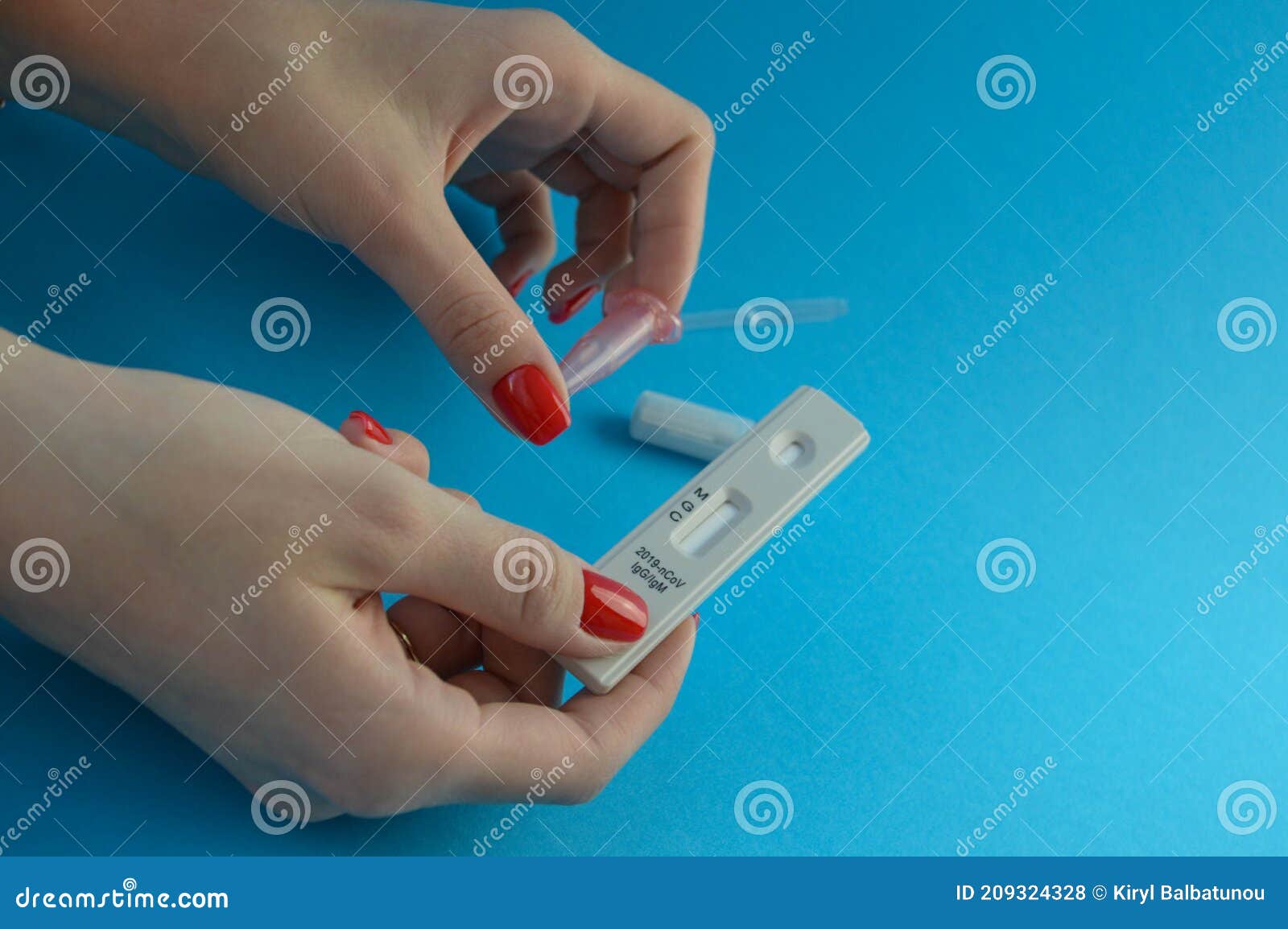 A Girl with a Bright Red Manicure Holds a Coronavirus Test and a Lancet for  a Blood Test in Her Hand. Determination of IgG and IgM Stock Photo - Image  of girl