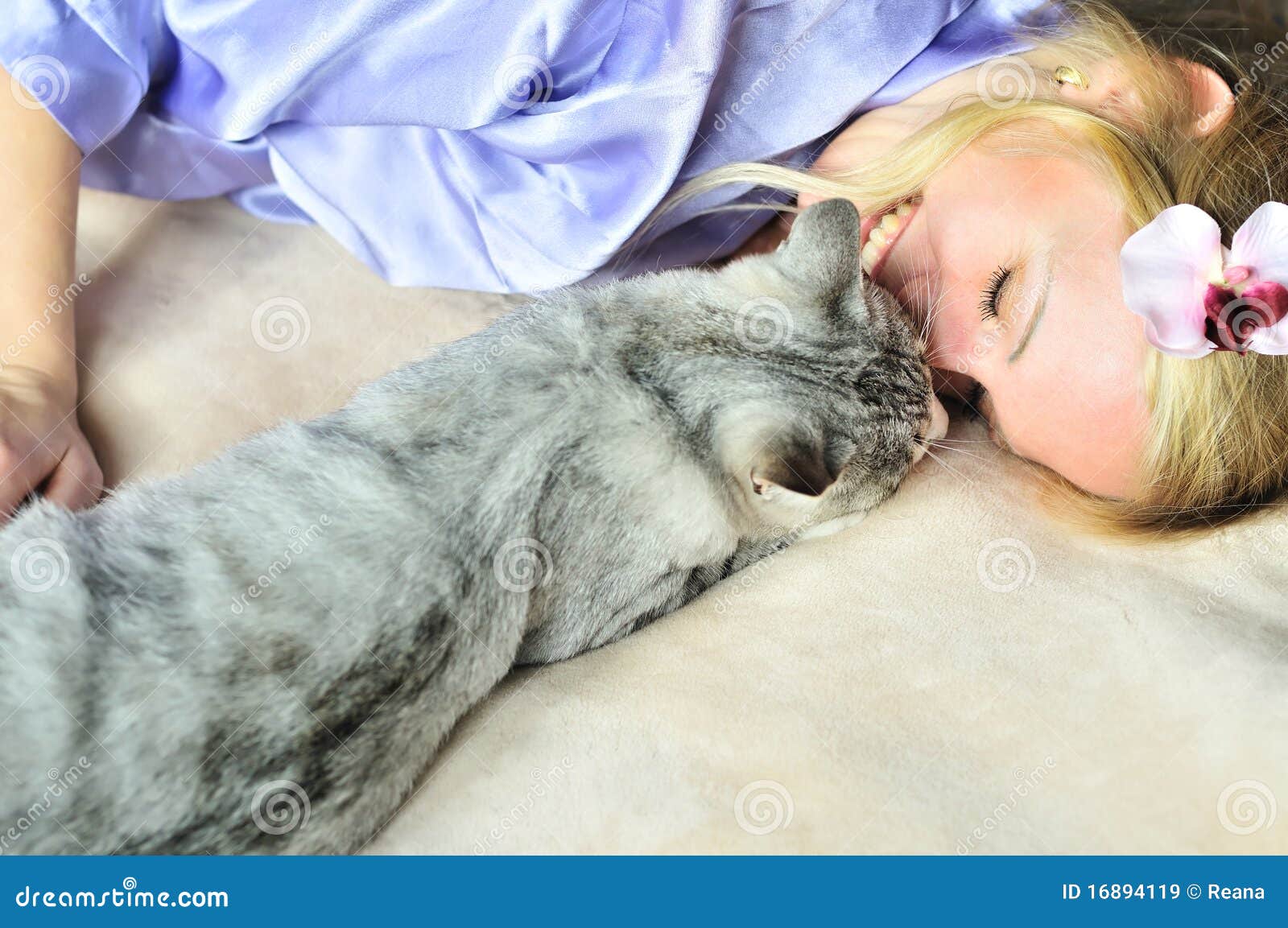 girl with caressing cat