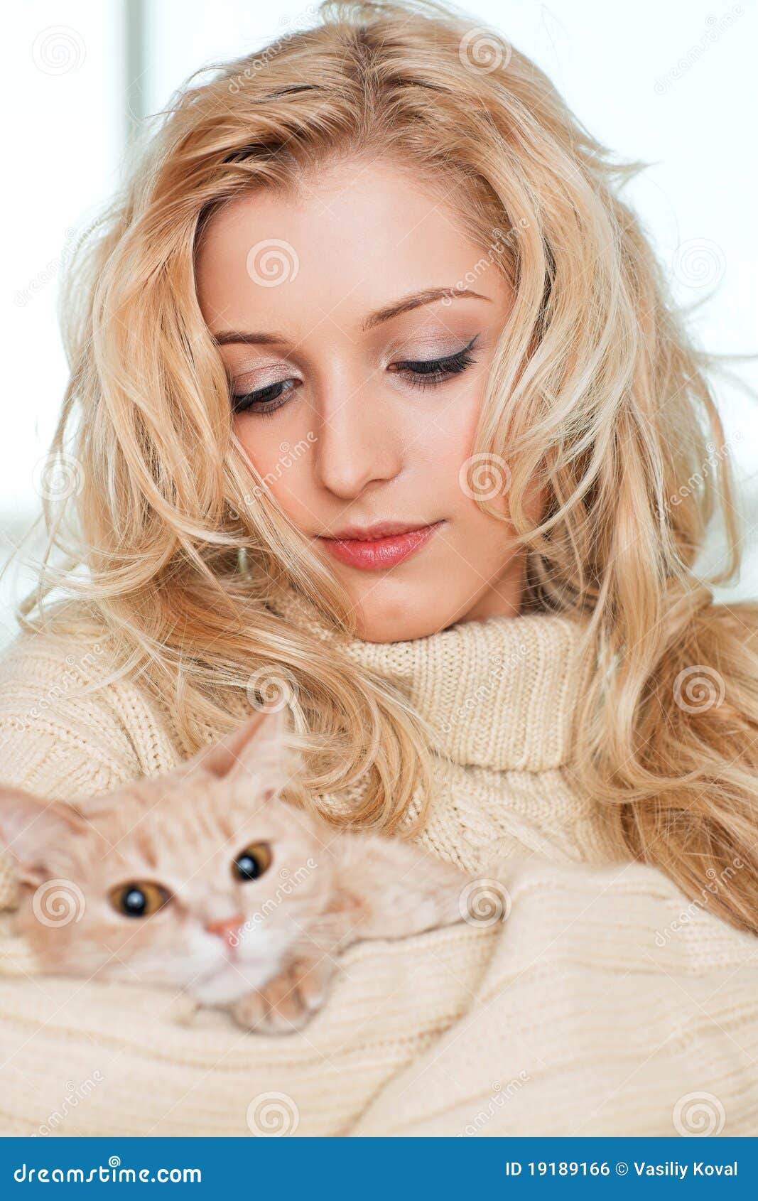 Girl with cat stock photo. Image of expression, face 19189166