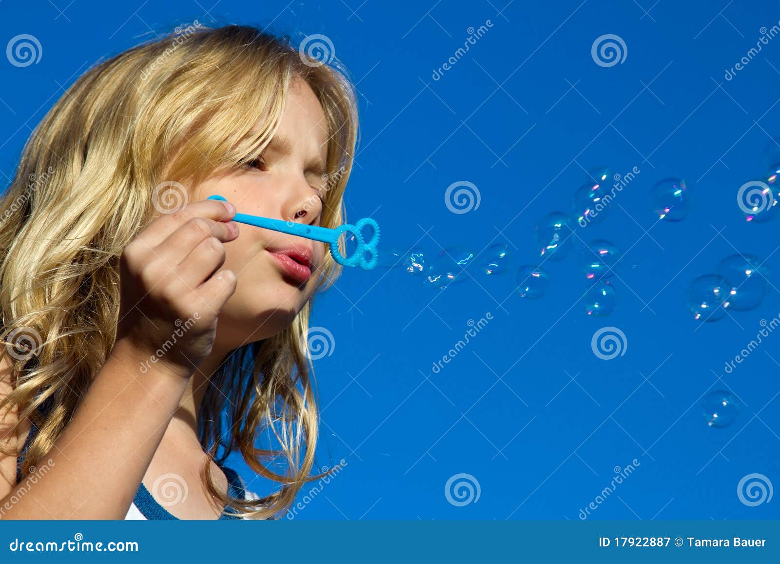 Boy Blowing Bubbles At The Park Royalty-Free Stock Photo ...