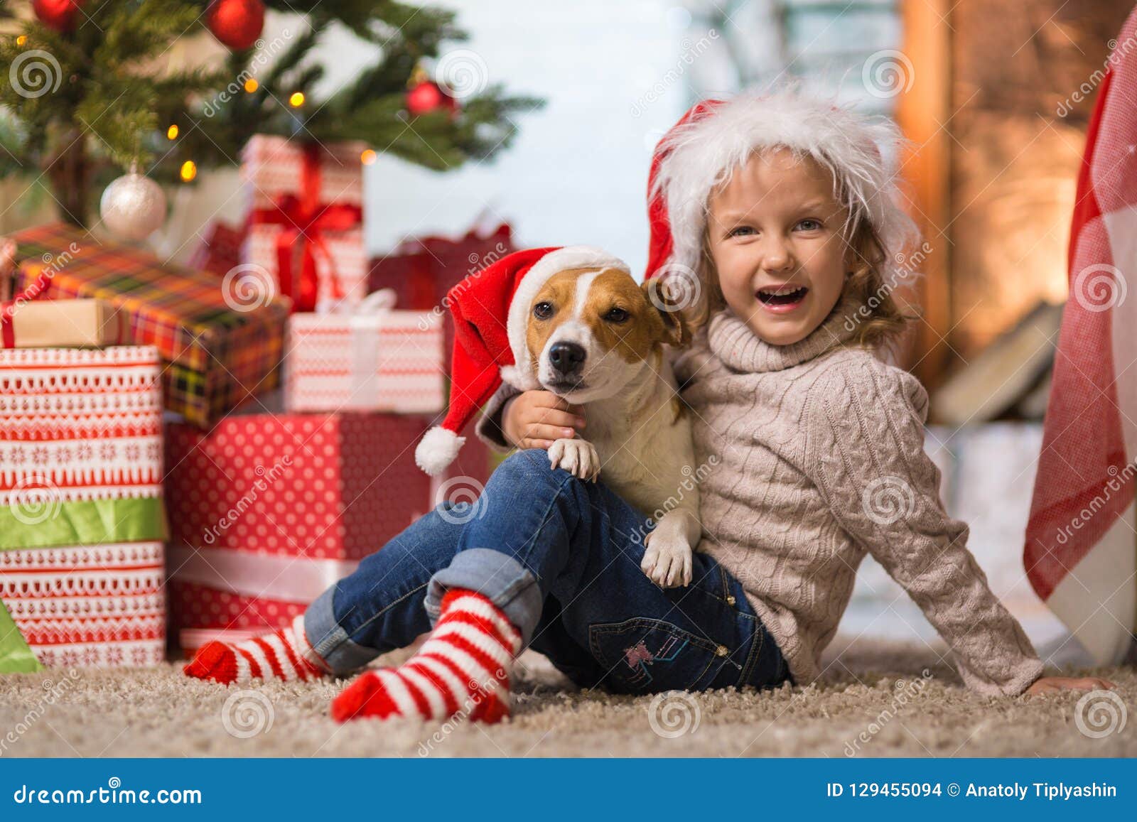 Girl Child Celebrating a Happy Christmas at Home by the Fireplace with ...