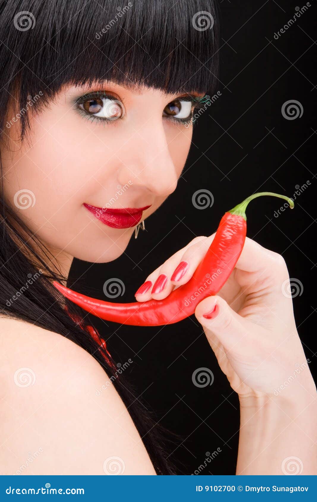 Girl with chili pepper stock photo. Image of 9102700