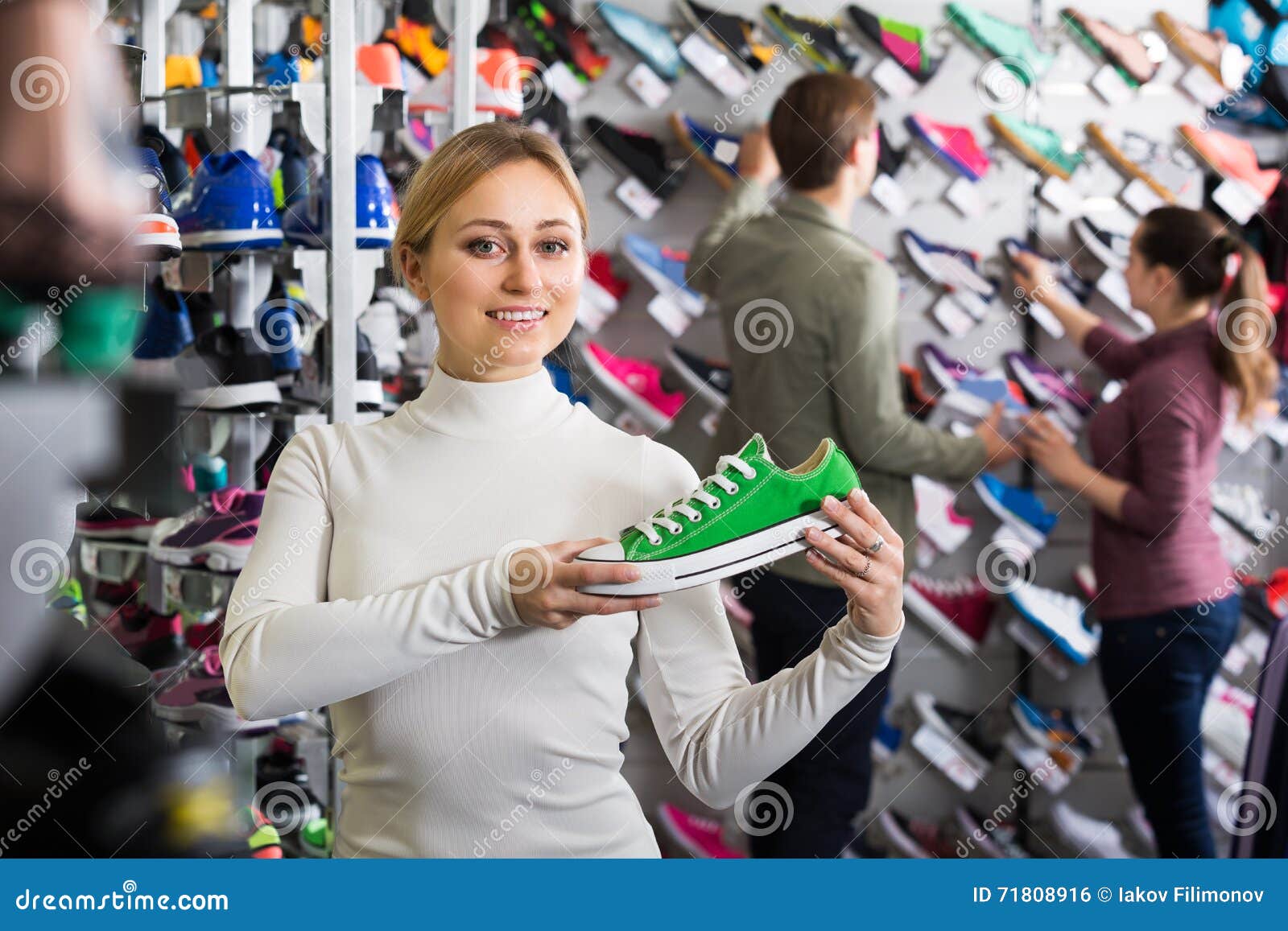 Girl Choosing Shoes in Store Stock Photo - Image of casual, sale: 71808916