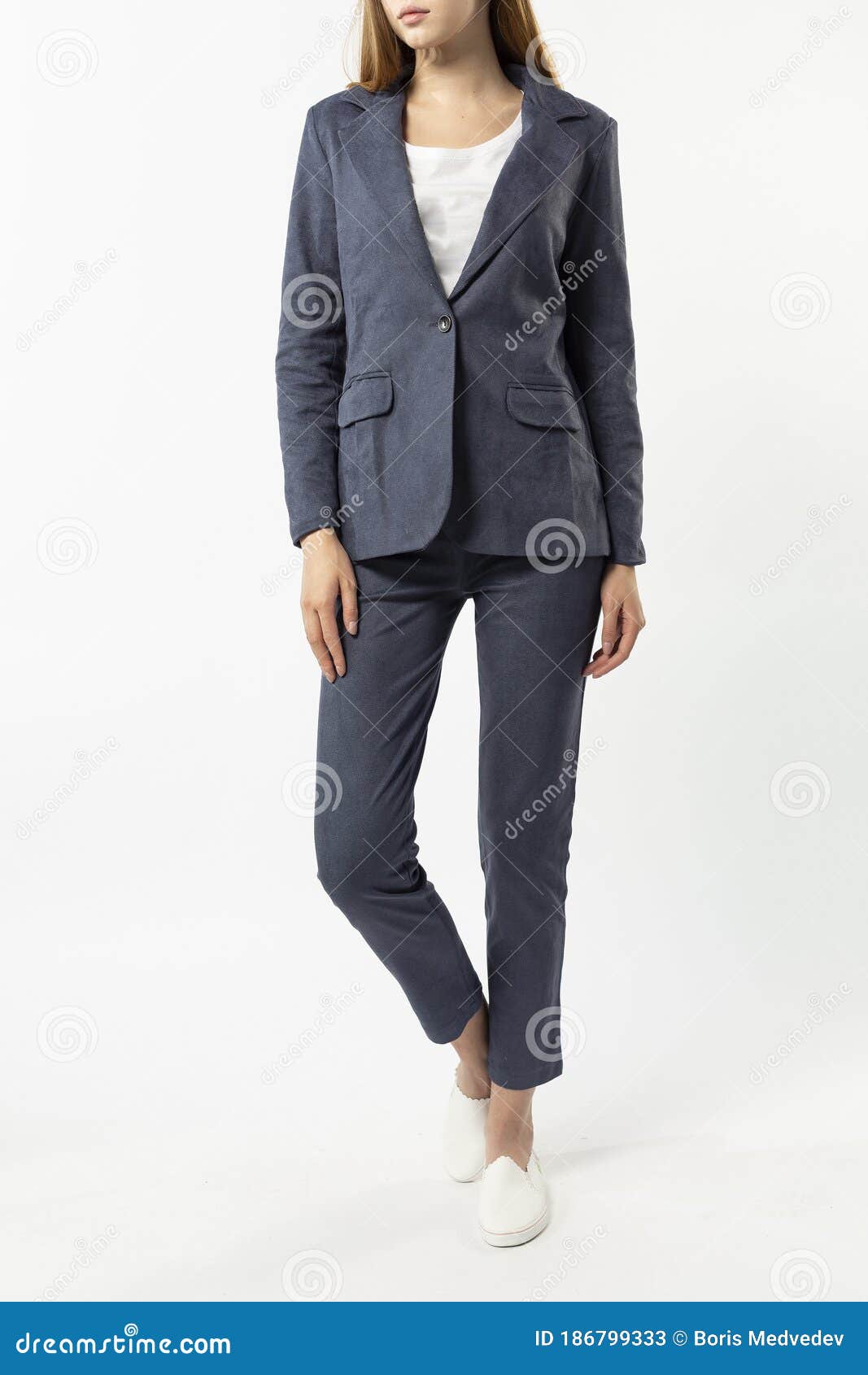 Girl in a classic pantsuit stock image. Image of isolated 186799333