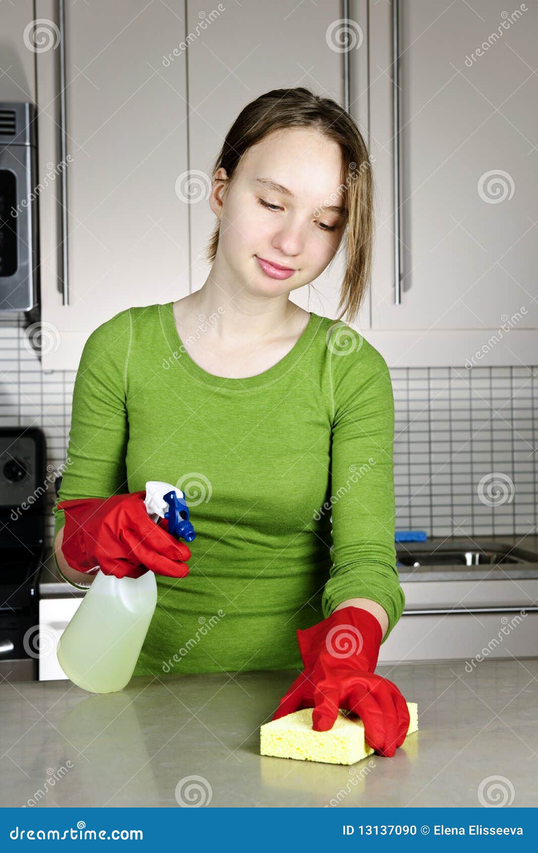 Girl cleaning kitchen stock photo. Image of glove, counter 13137090