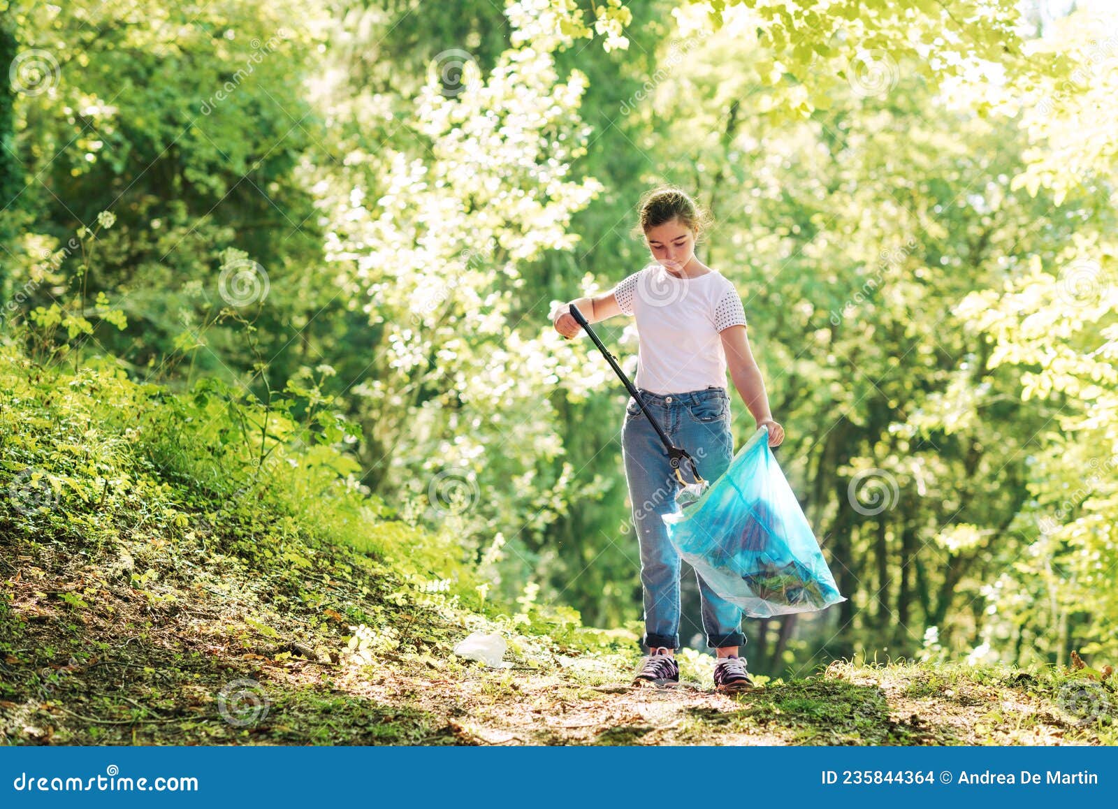 Girl Cleaning Up the Forest and Collecting Trash Stock Photo - Image of ...