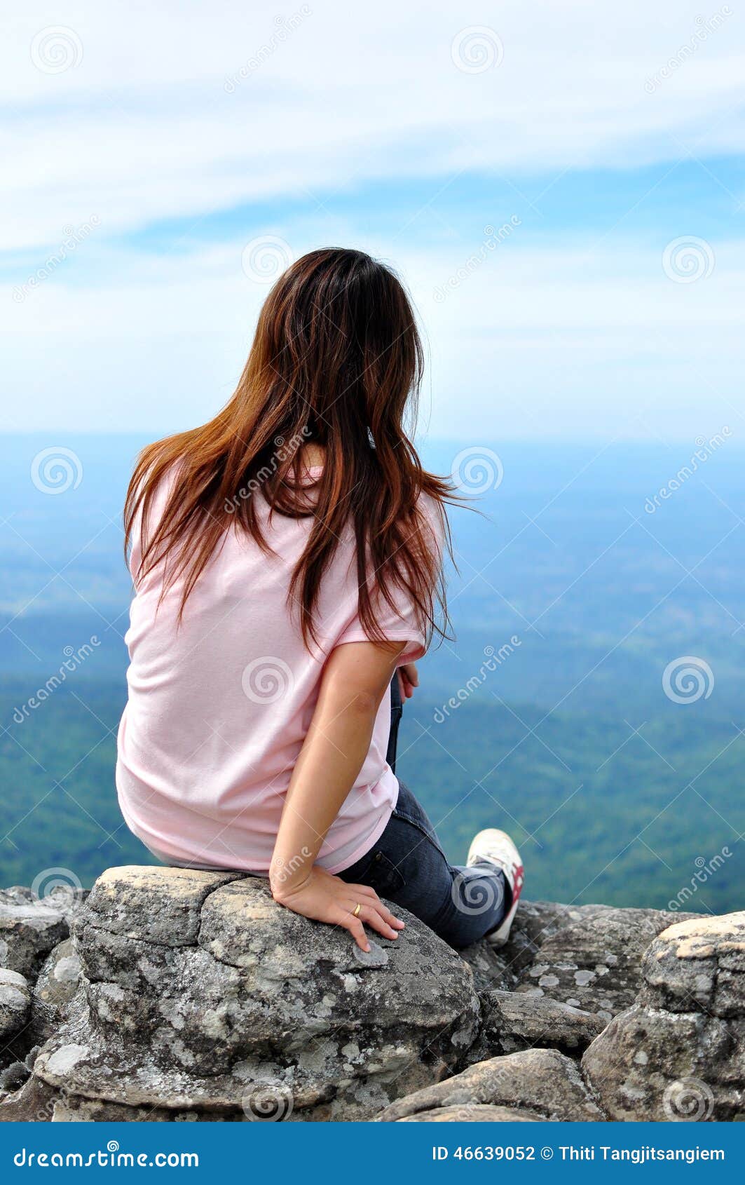 Girl on a cliff stock photo. Image of peaceful, cloud 46639052