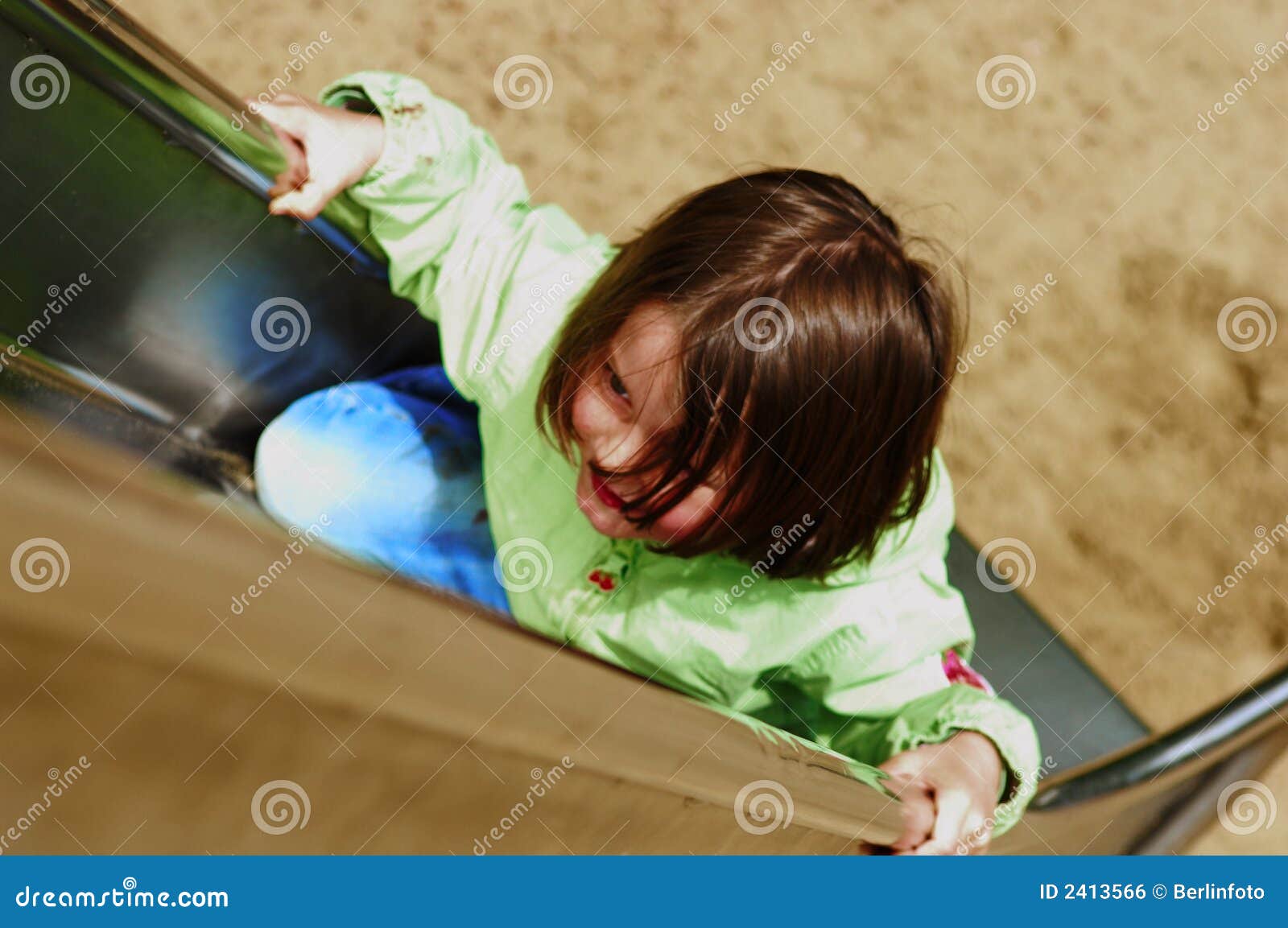 girl climbing chute