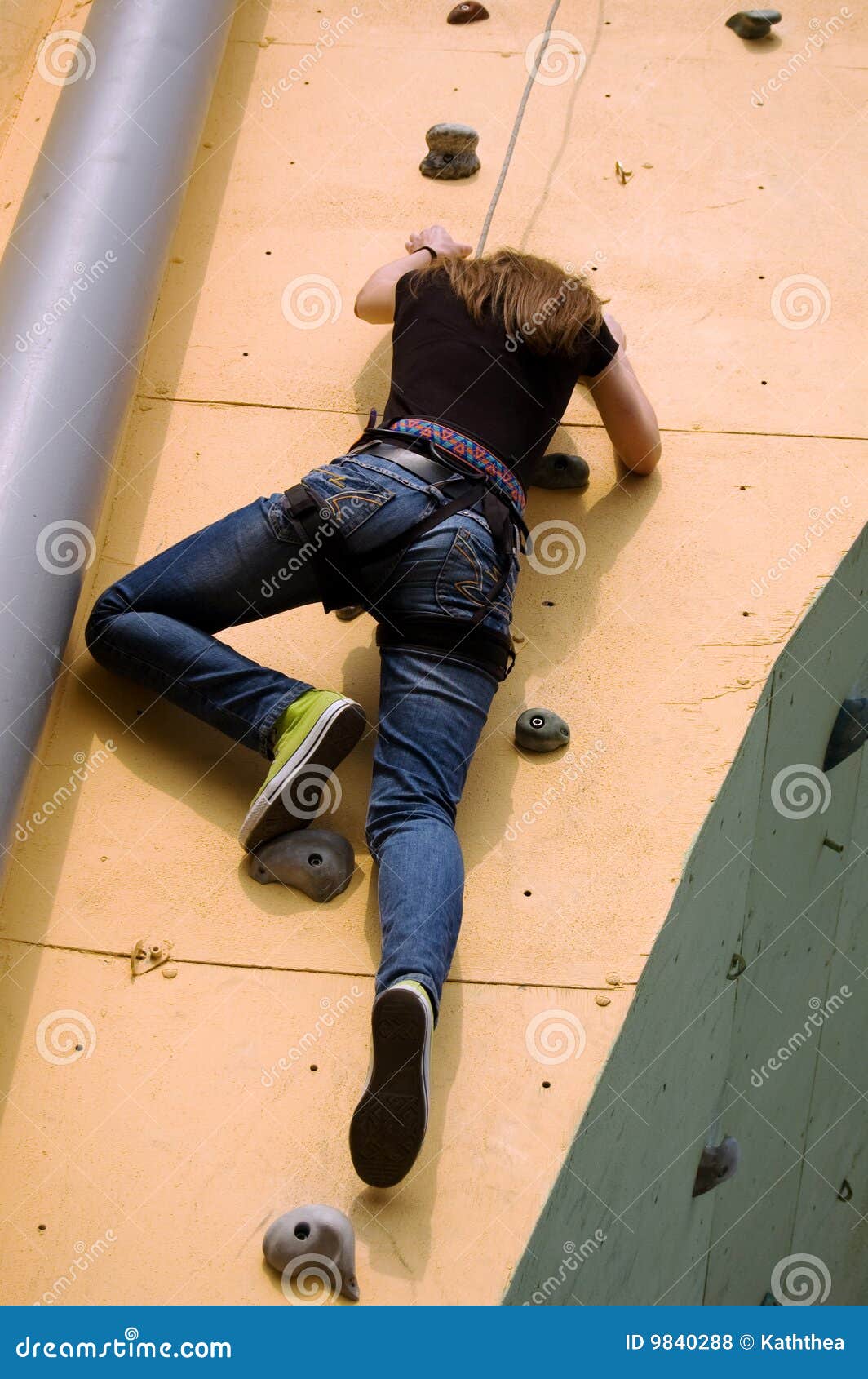 A Girl Climbing To the Top of the Wall Stock Photo Image of girl