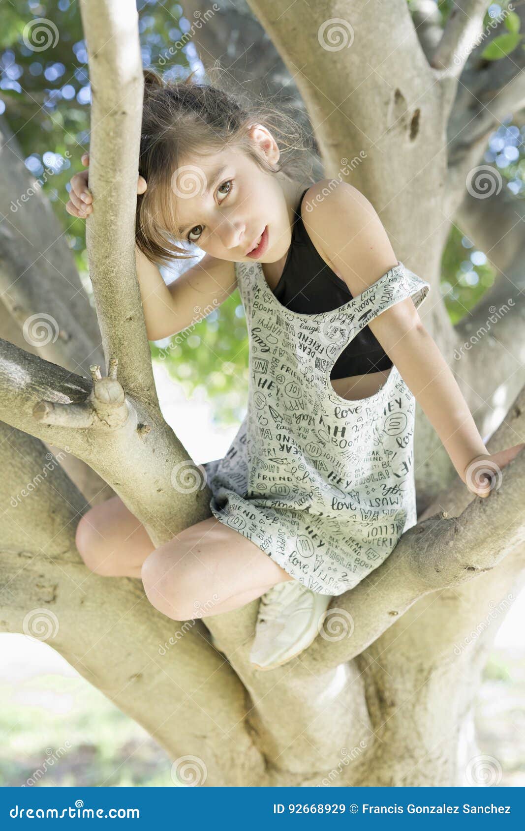 Girl Climbing A Tree To Take A Photo Stock Image Image Of Park Model 92668929