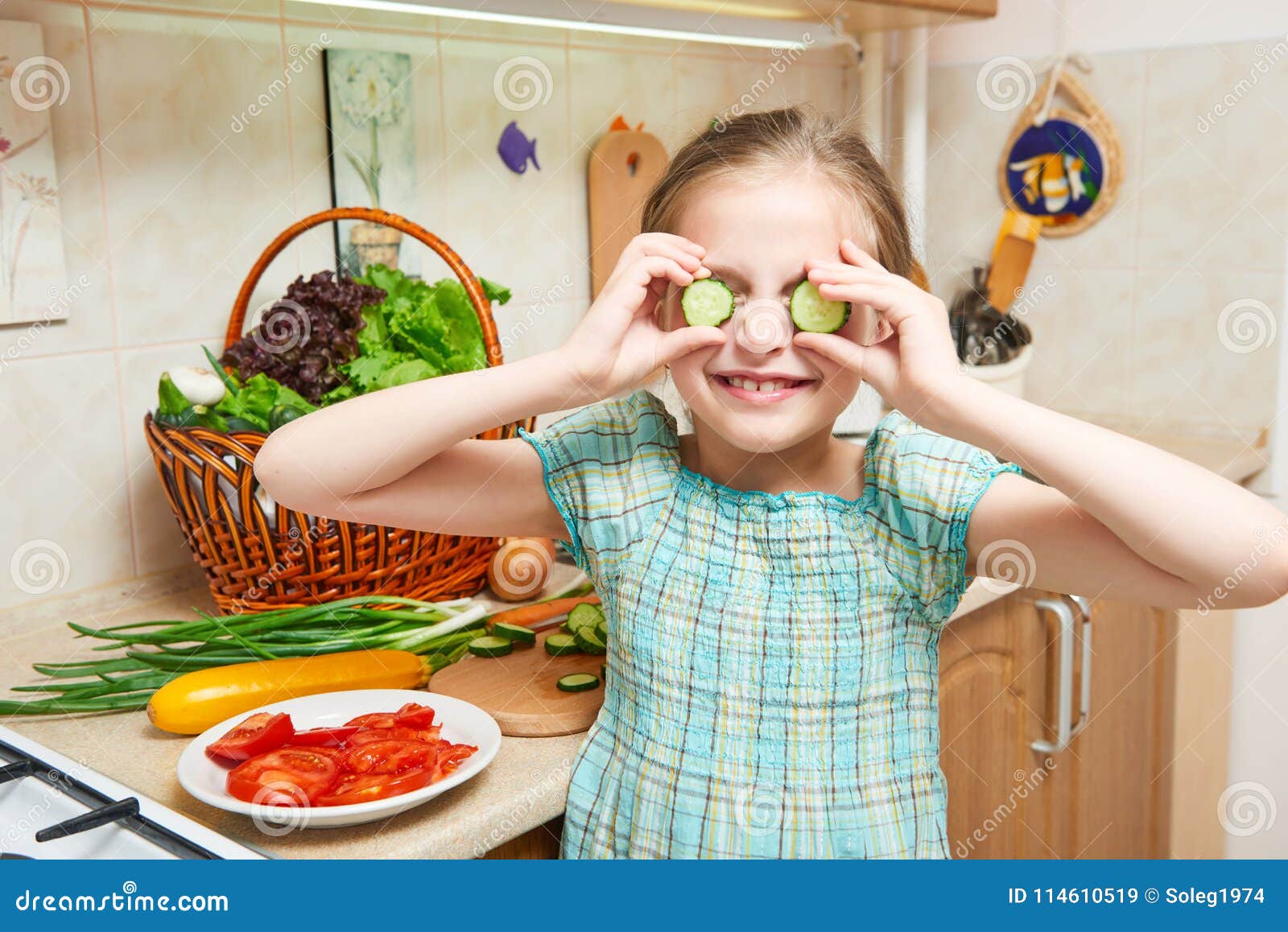 Girl Closes Her Eyes With Cucumbers And Have Fun In Home Kitchen