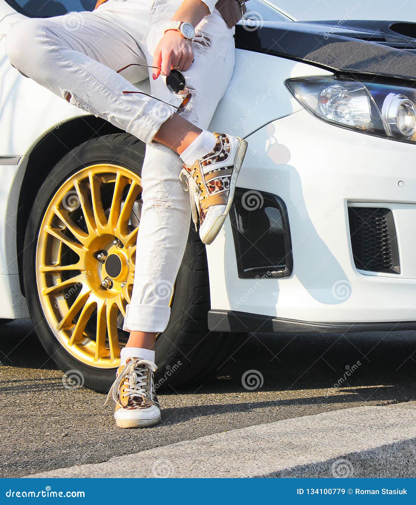 Girl in Colored Sneakers Shoes and in White Trousers on Background of White  Car. Girl on Car Background Stock Image - Image of elegant, cars: 134100779