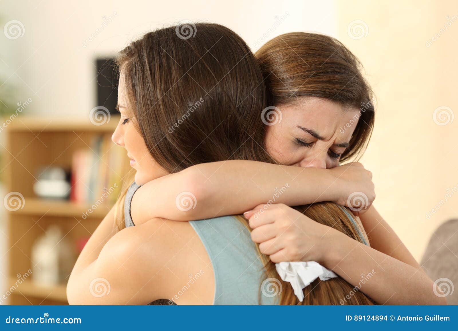 girl consoling to her sad best friend