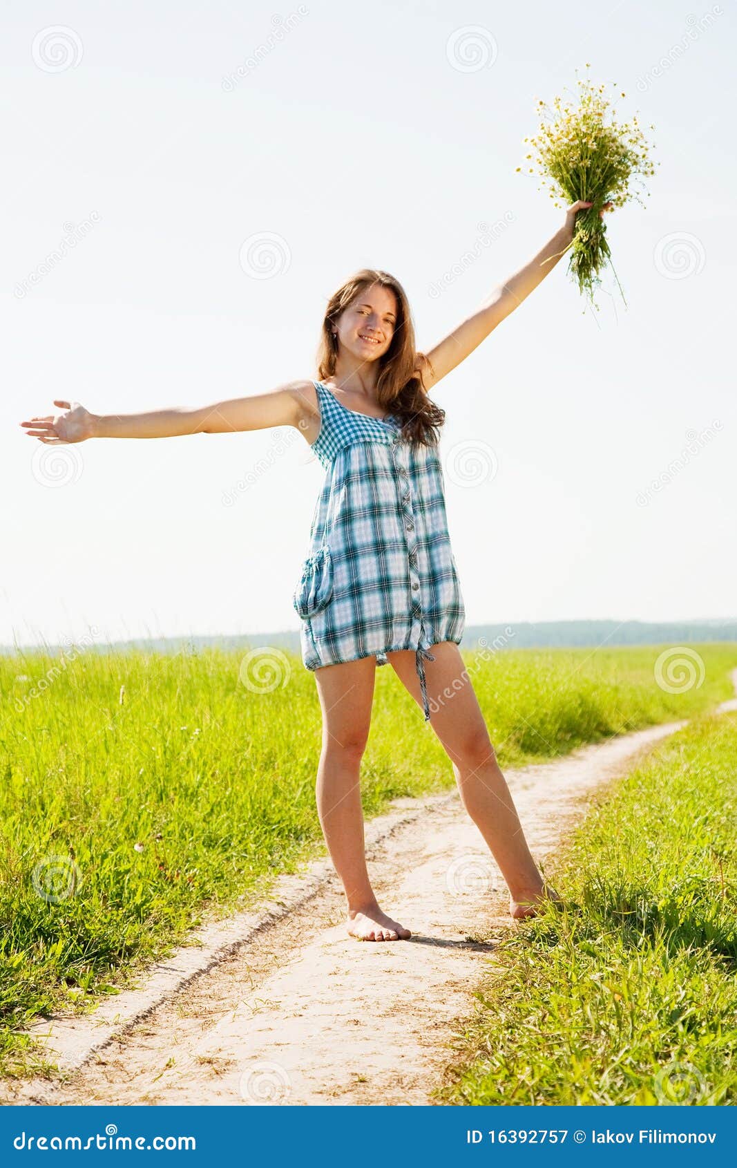 Girl on country road stock image. Image of bare, bouquet 16392757