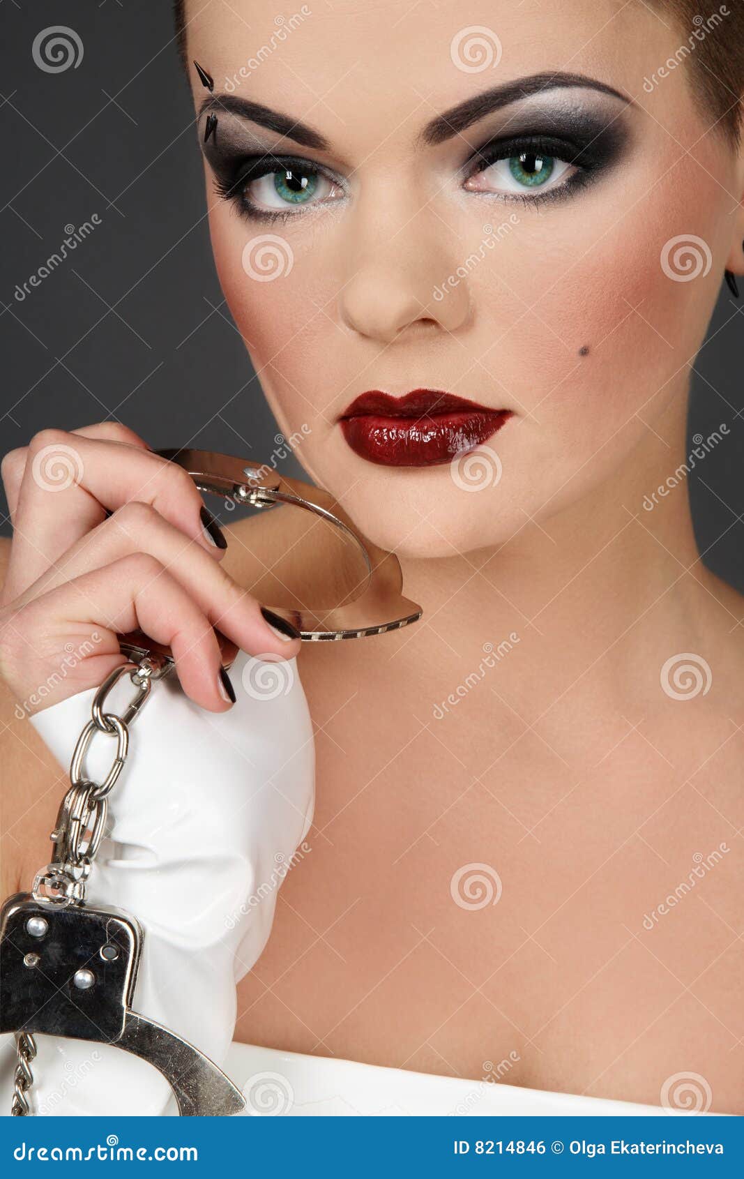 Girl with cuffs stock photo. Image of female, cuffs, face 8214846