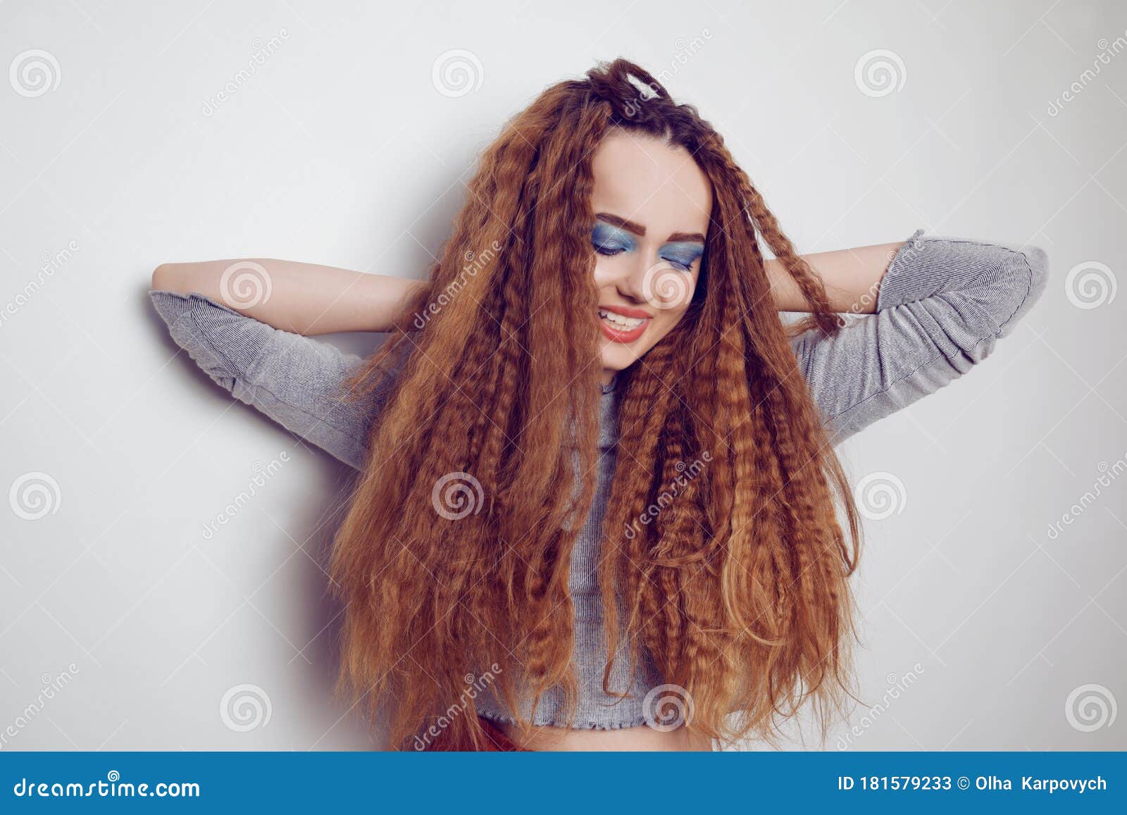 Girl with Curled Voluminous Hair, Model with Hairstyle in the Style of the 80s. 90s, with Bright Blue Make-up Stock Image - Image of hair, beautiful: 181579233 Girl with Curled Voluminous Hair, Model with Hairstyle in the Style of the 80s. 90s, with Bright Blue Make-up Stock Image - Image of hair, beautiful: 181579233