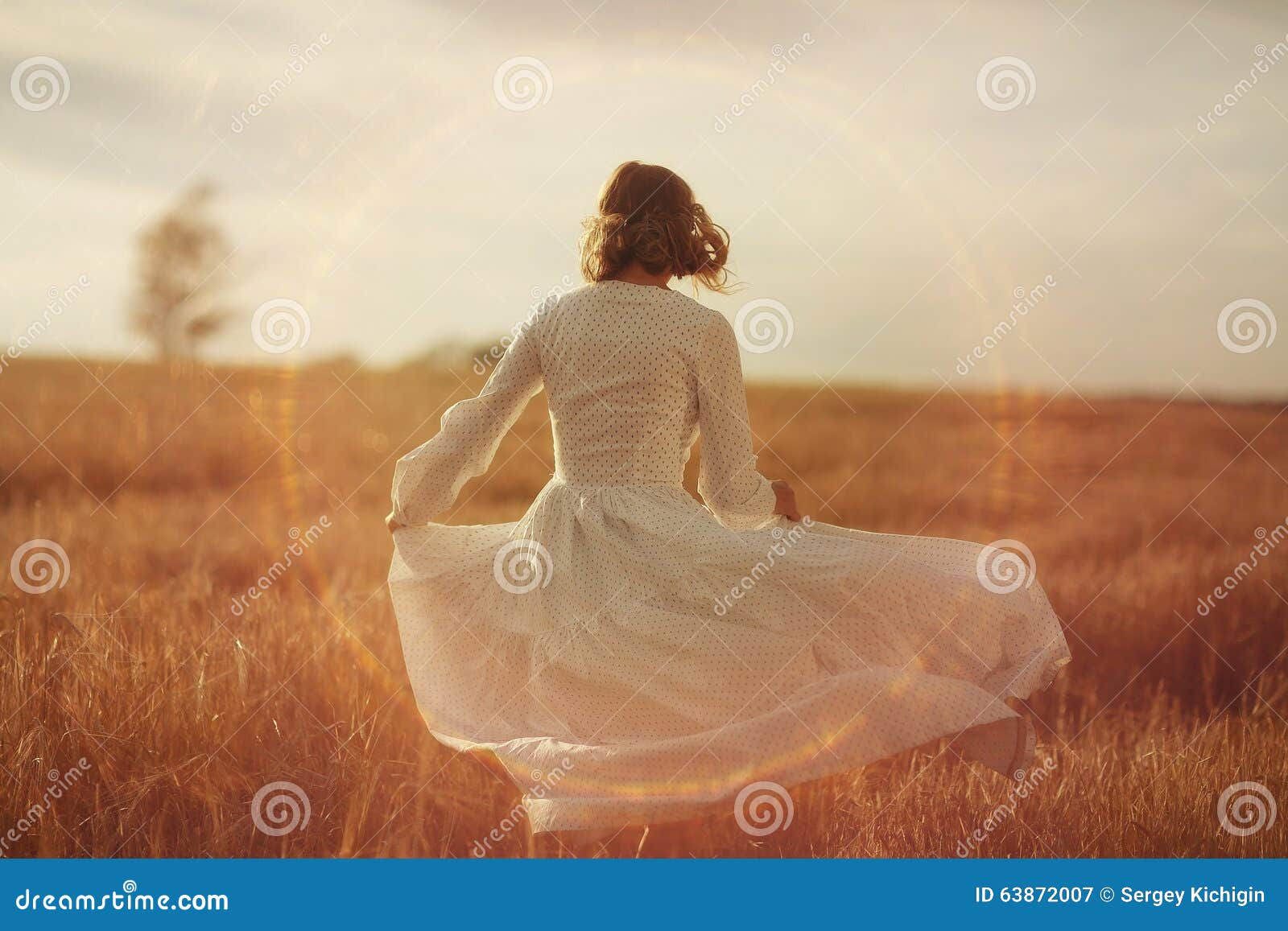 Girl Dancing in Field in White Dress Stock Image Image of field