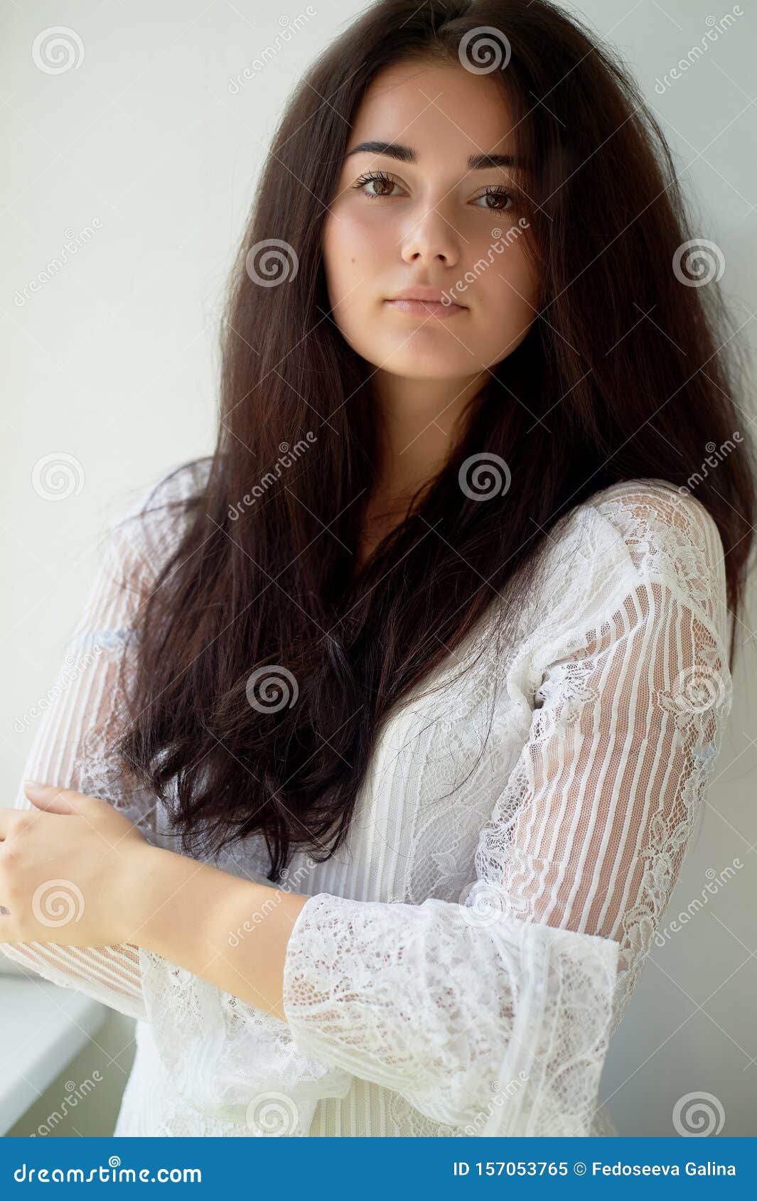 A Girl With Dark Eyebrows Brown Eyes And Dark Hair Natural Beauty Thick Wide Eyebrows Natural Beauty Stock Image Image Of Glass Water 157053765