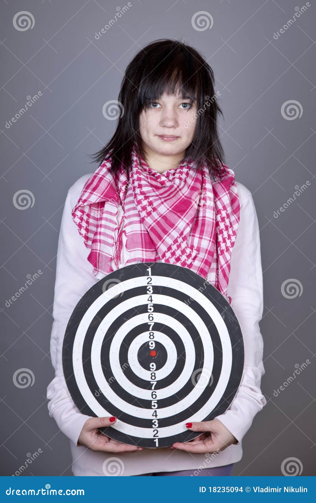 Girl with darts. stock photo. Image of studio, teen, female 18235094