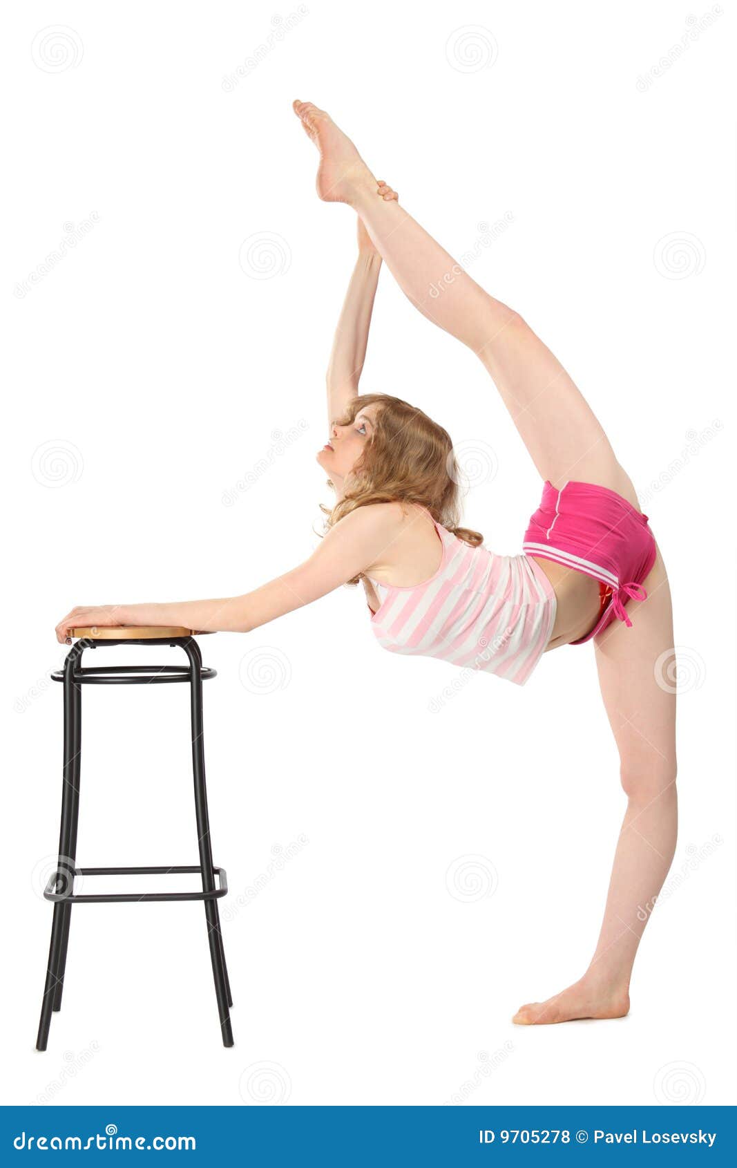 girl does gymnastics, keeping for stool