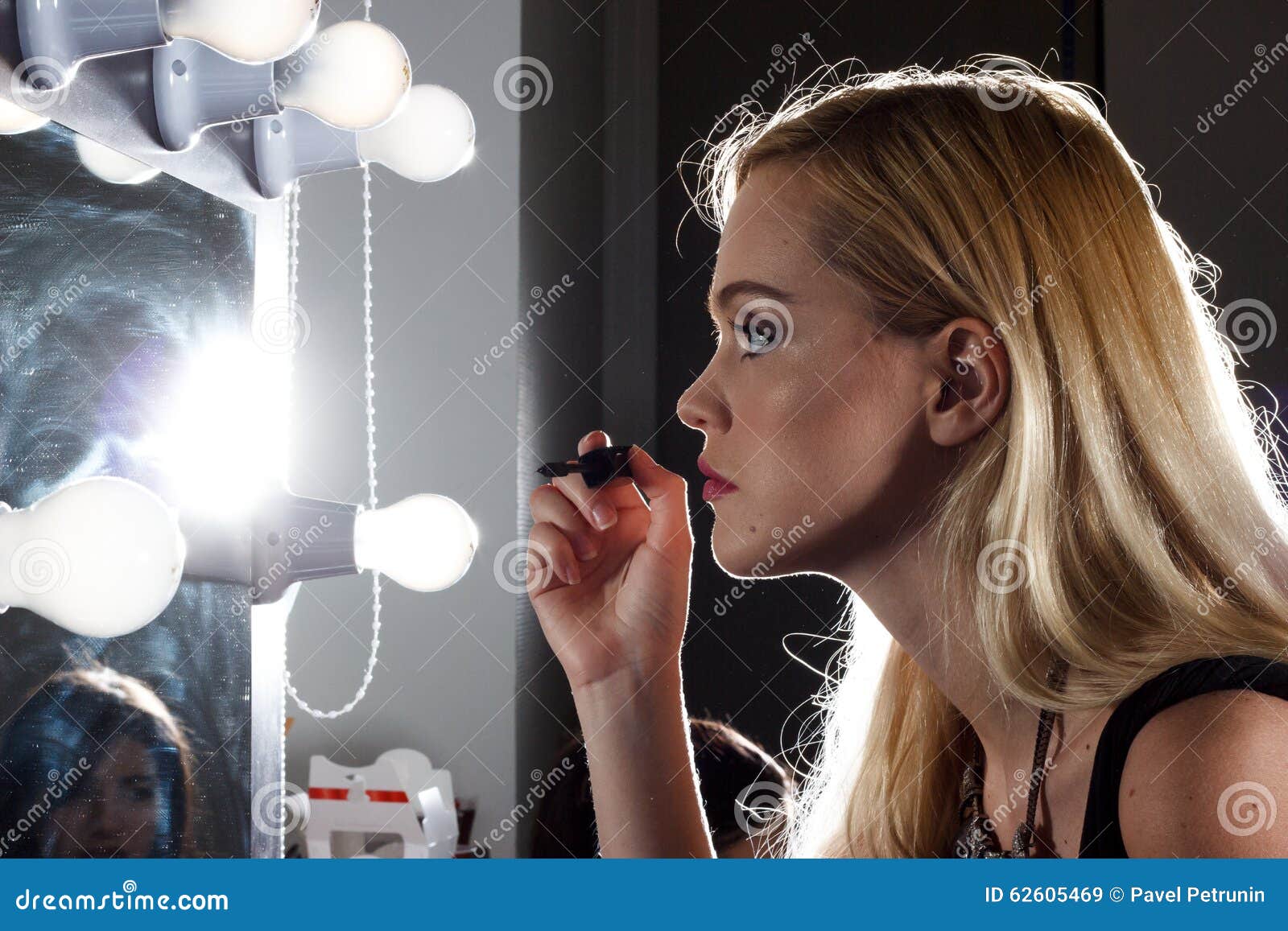 Girl does makeup. stock image. Image of beauty, blush 62605469