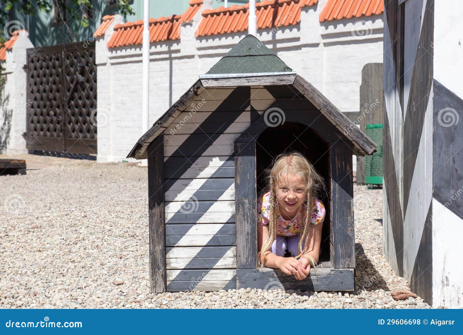 Girl in dog house stock photo. Image of doghouse, smiling 29606698