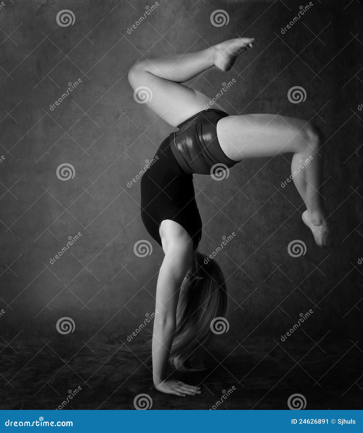 Girl doing back bend stock image. Image of black, balance - 24626891