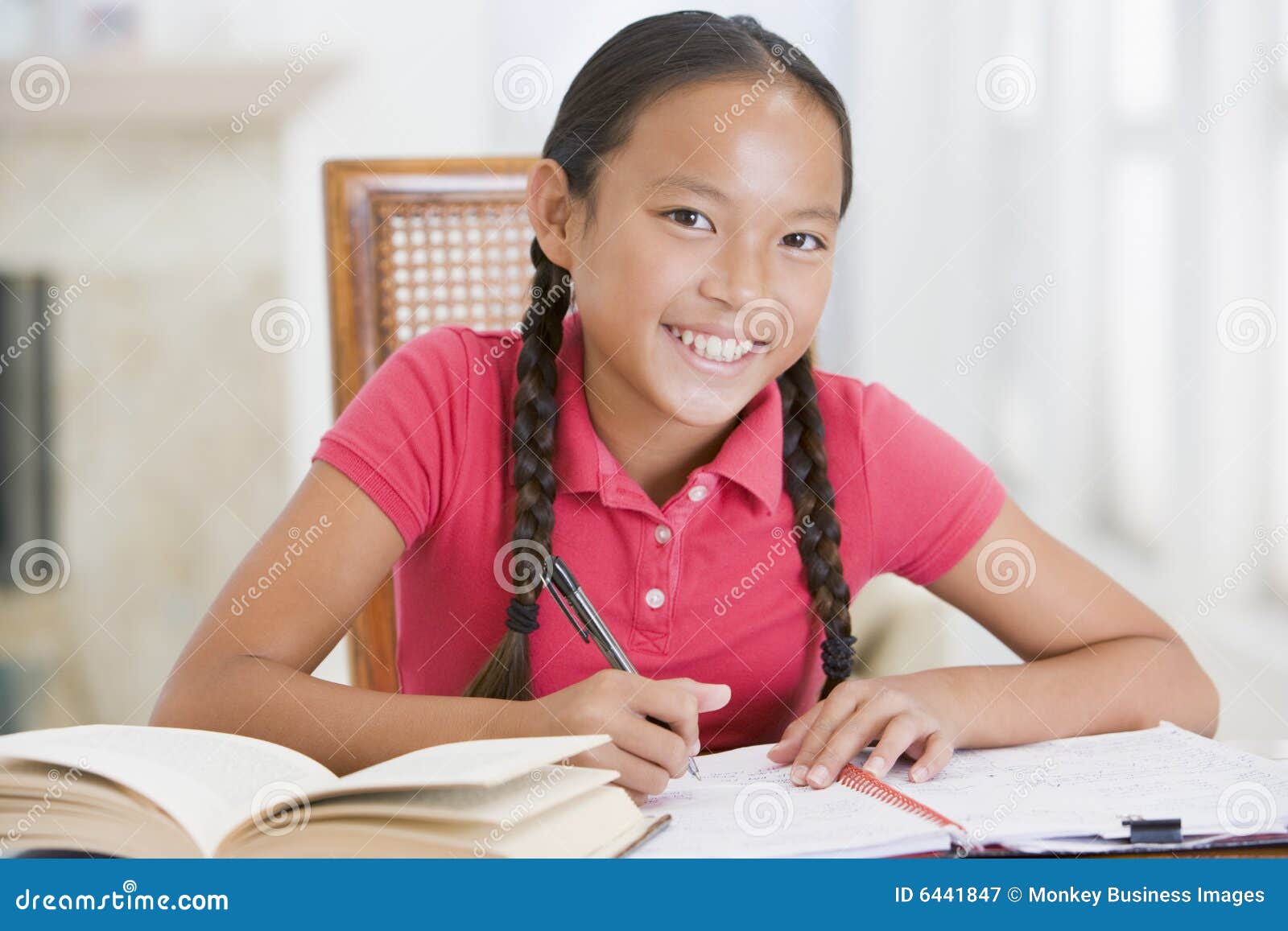 girl doing her homework